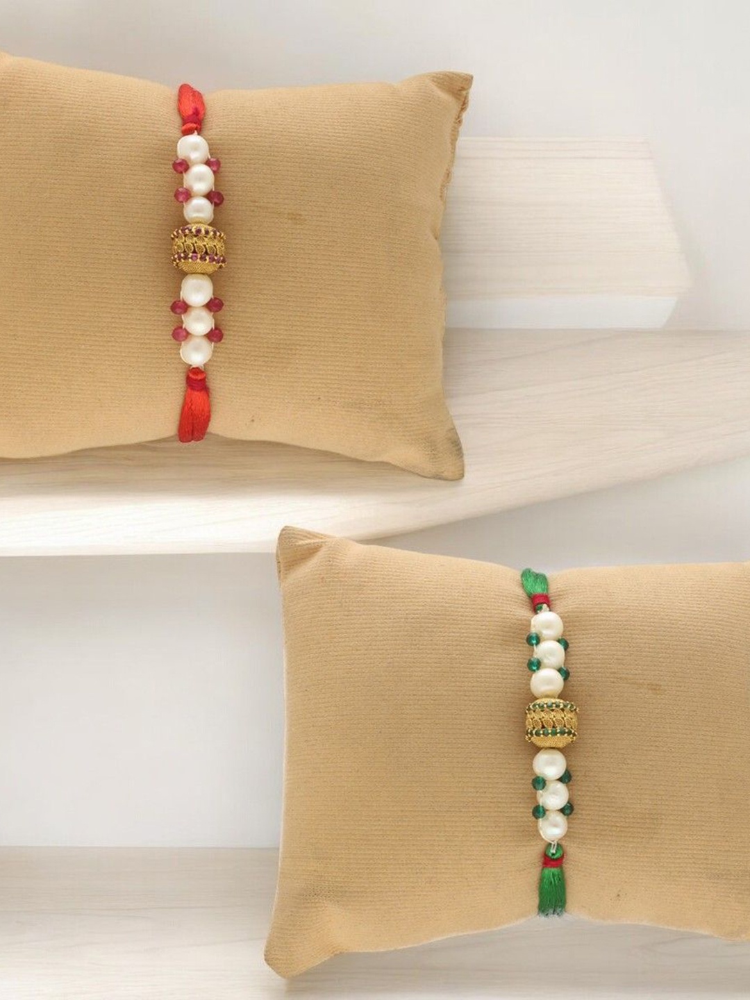 

Sri Jagdamba Pearls Dealer Set Of 2 Fresh Water Pearl Beaded Thread Rakhi, White