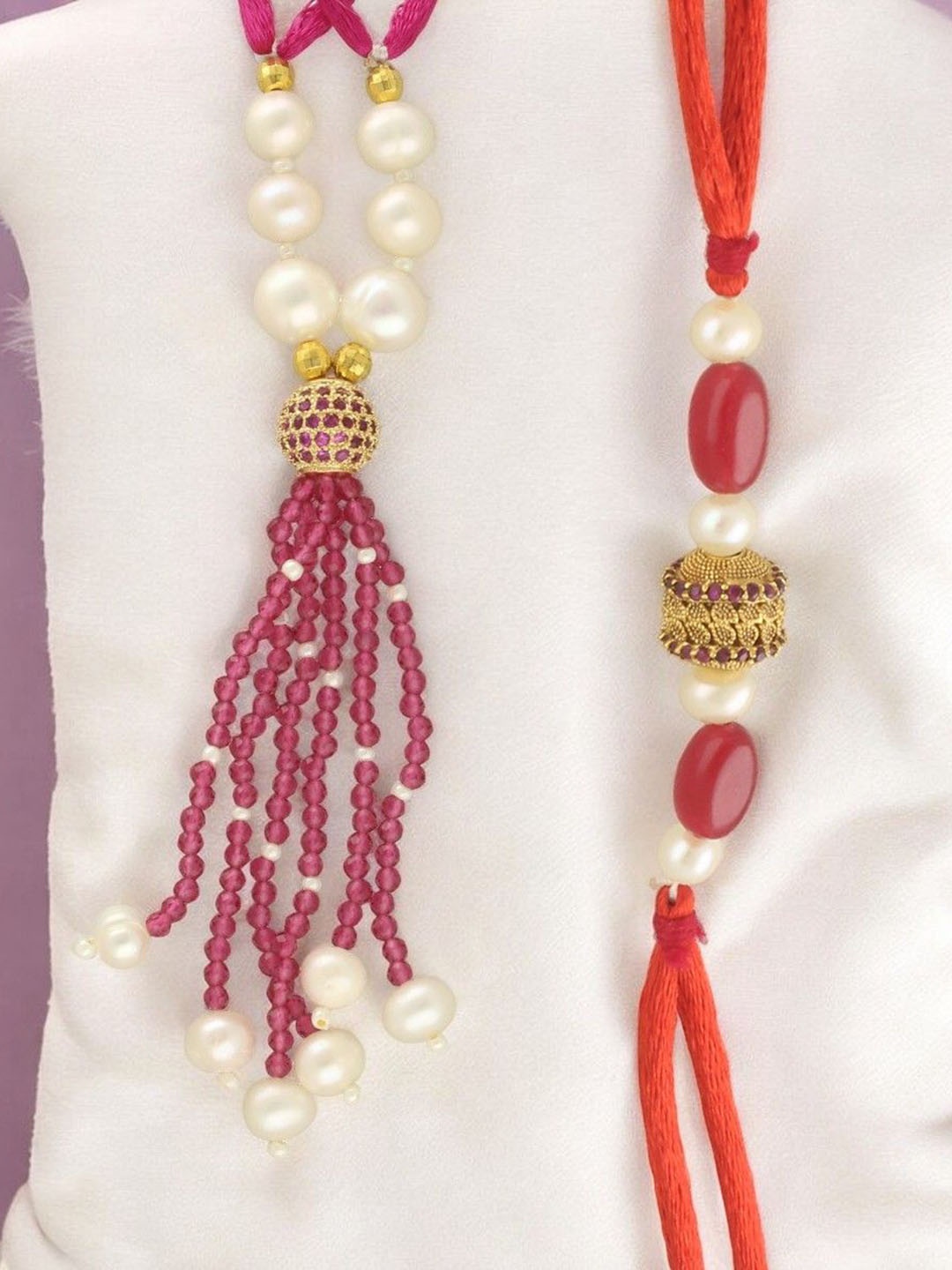 

Sri Jagdamba Pearls Dealer Gleaming Designer Fresh Water Pearls Bhaiya Bhabi Thread Rakhi, White