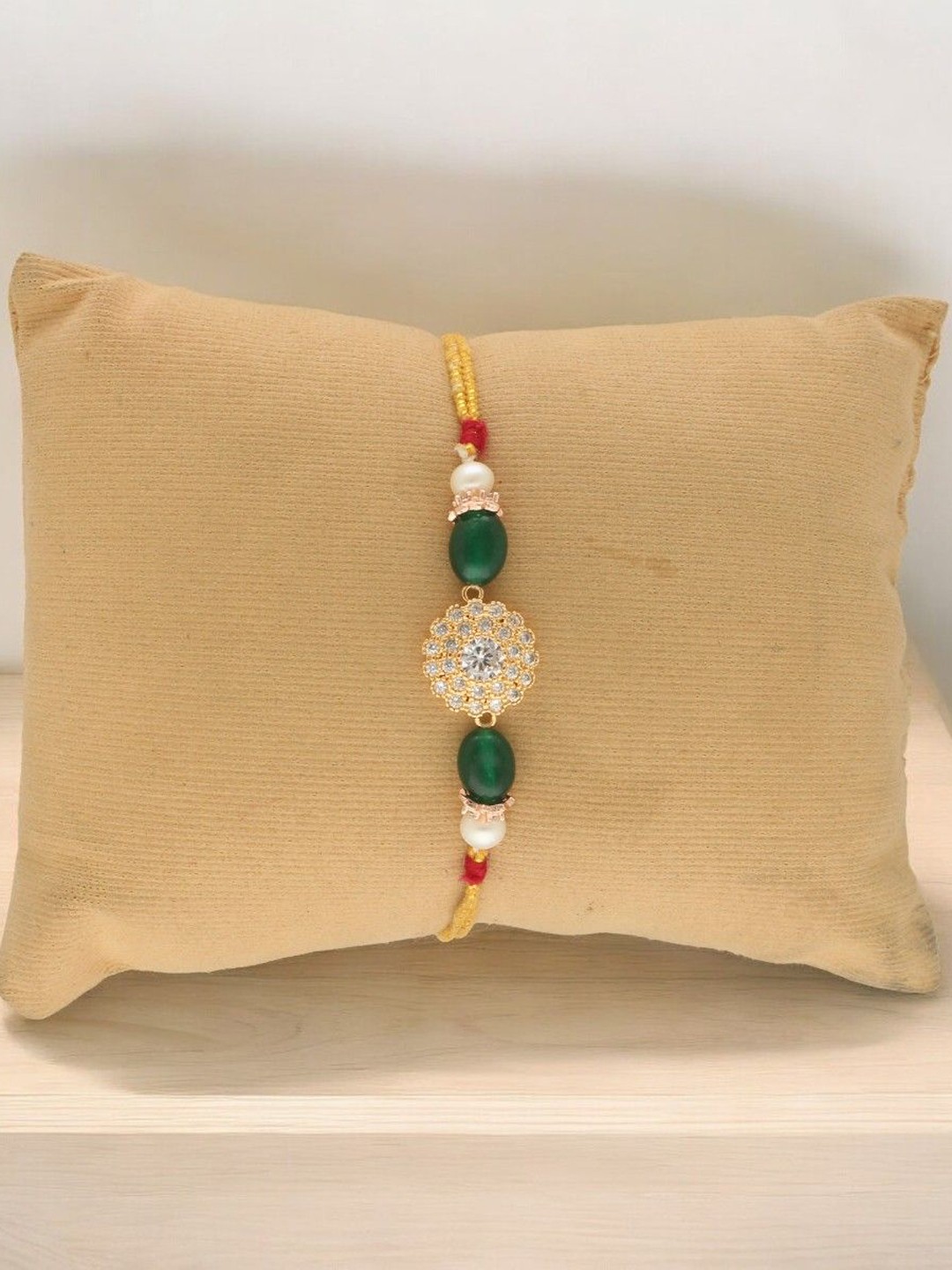 

Sri Jagdamba Pearls Dealer Fresh Water Pearls Thread Rakhi, White