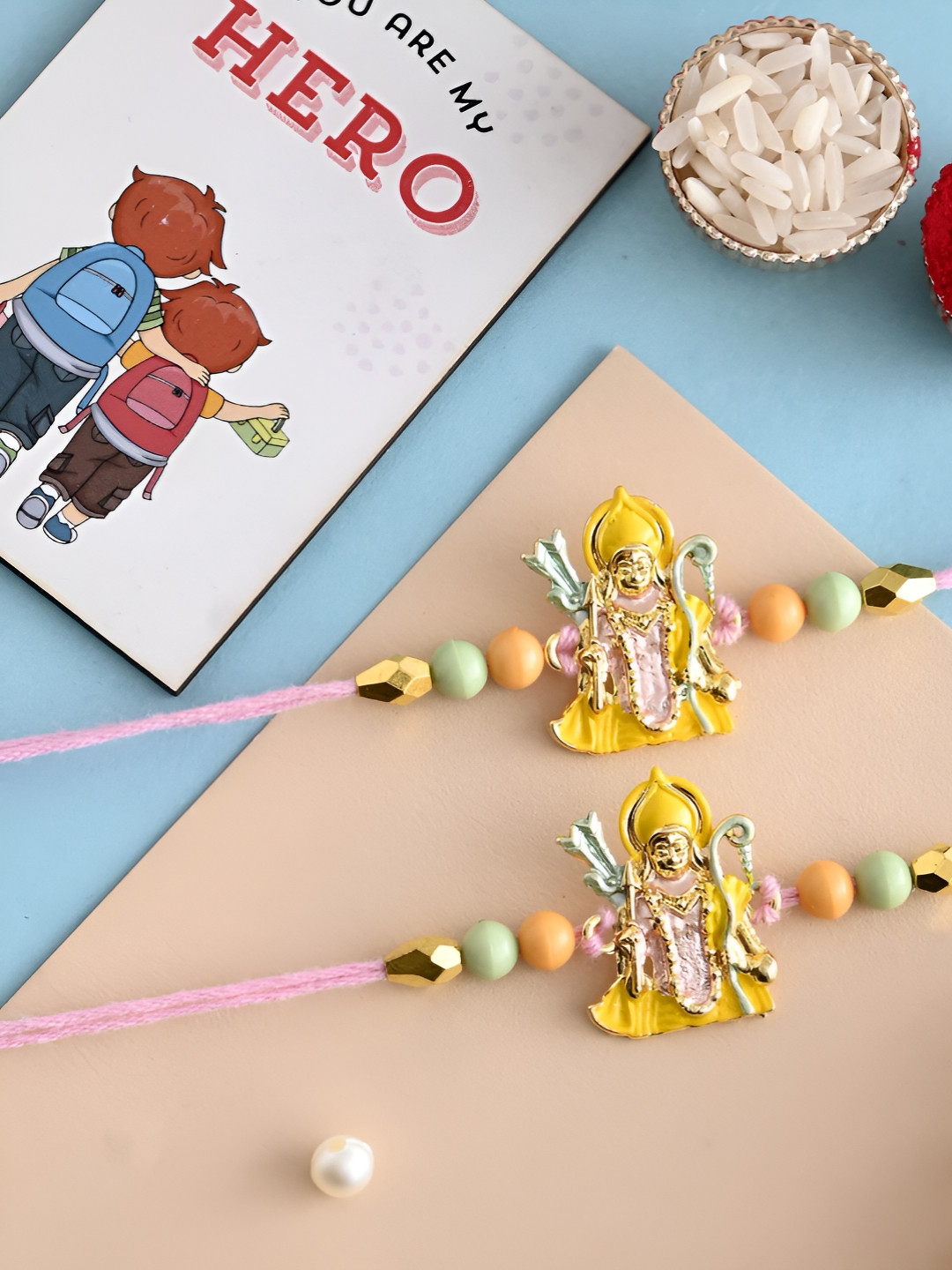

Ascension Set Of 3 Rakhi With Fridge Magnet & Roli Chwal, Yellow