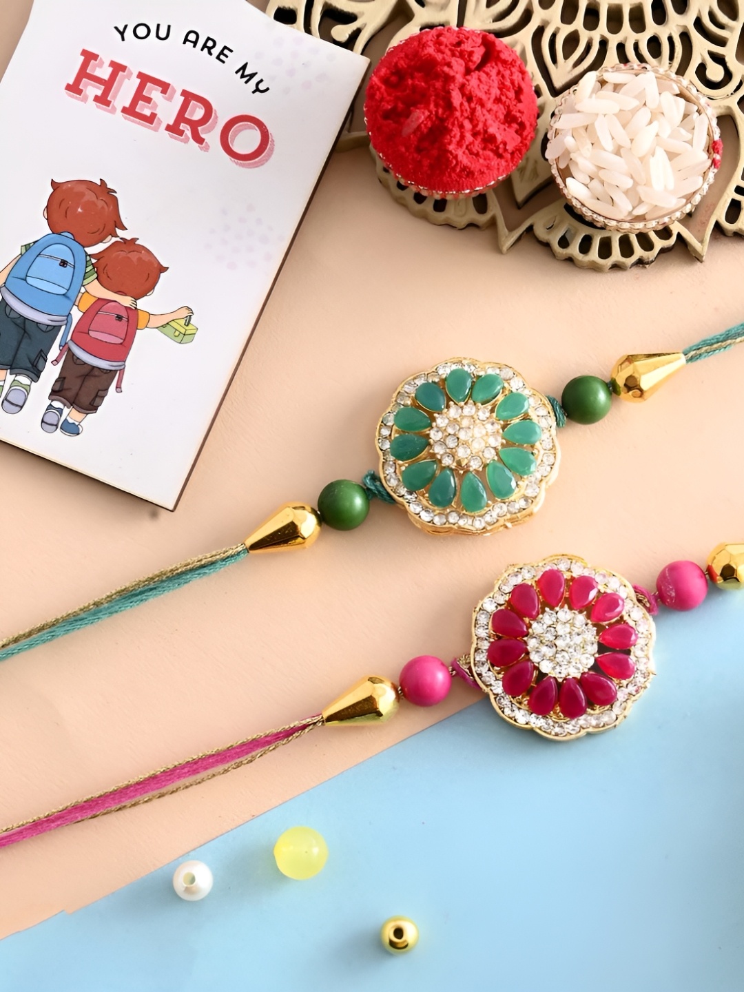 

Ascension Set Of 3 Rakhi With Fridge Magnet & Roli Chwal, Pink