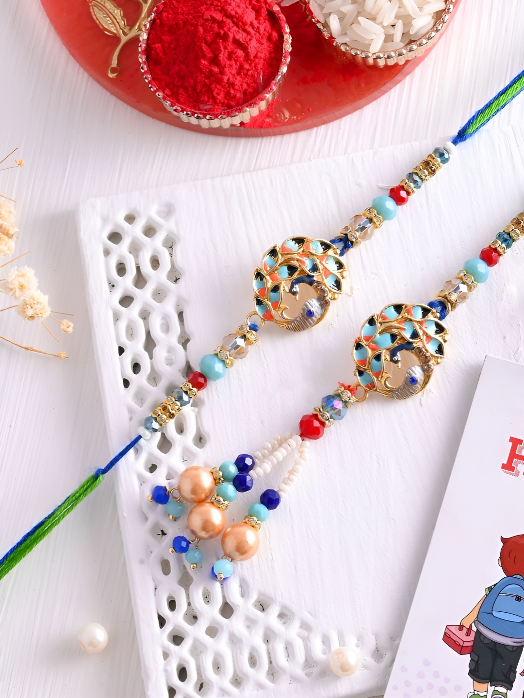 

Ascension Set Of 3 Rakhi With Fridge Magnet & Roli Chwal, Gold