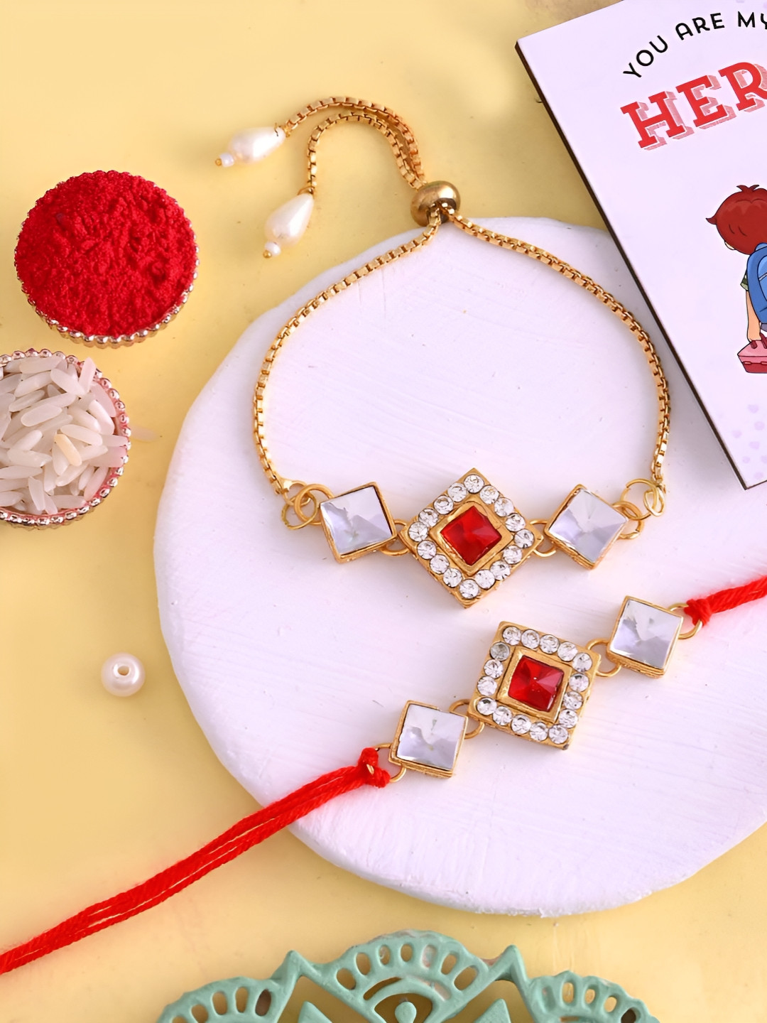 

Ascension Set Of 3 Rakhi With Fridge Magnet & Roli Chwal, Gold