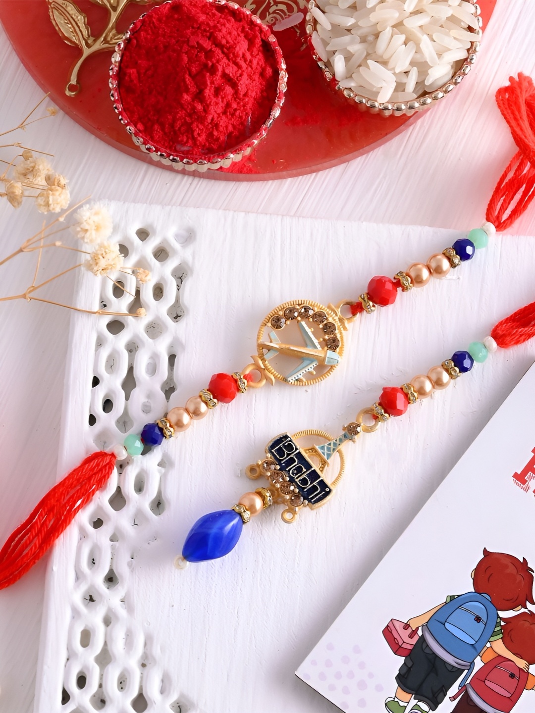 

Ascension Set Of 3 Rakhi With Fridge Magnet & Roli Chwal, Red