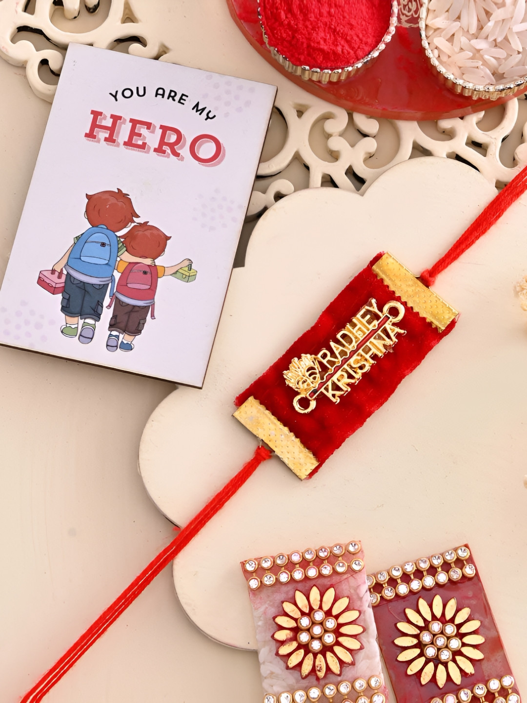 

Ascension Set Of 2 Rakhi With Fridge Magnet & Roli Chwal, Red