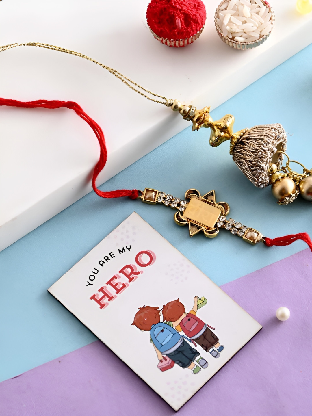 

Ascension Set Of 3 Rakhi With Fridge Magnet & Roli Chwal, Gold