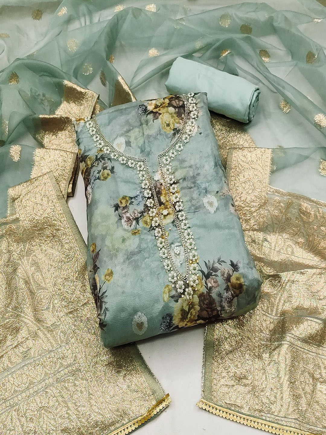 

Lilots Floral Printed Beads and Stones Unstitched Dress Material, Turquoise blue