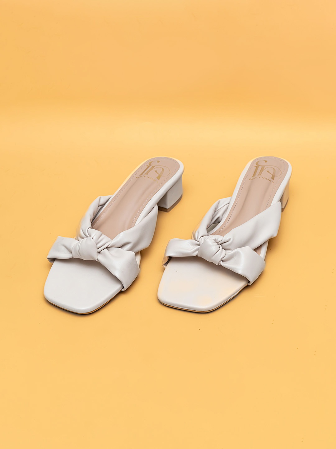 

Fancy Nancy Women Mules with Bows Flats, Cream