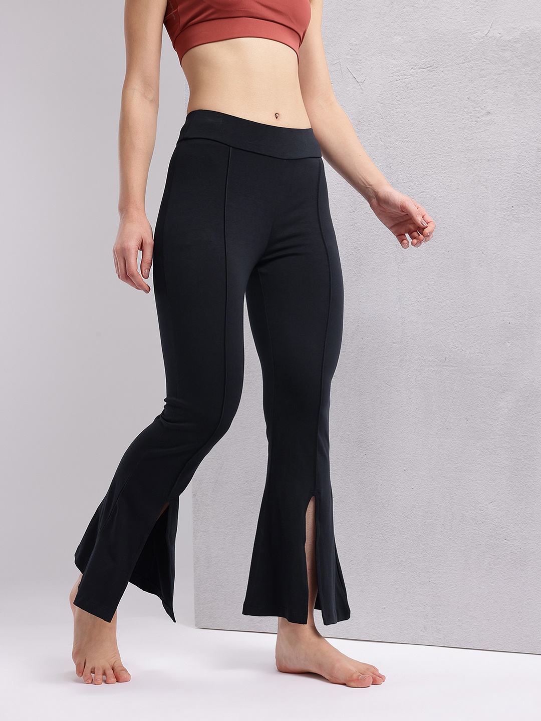 

HRX by Hrithik Roshan Women Slit Hem Paneled Flared Yoga Track Pants, Black