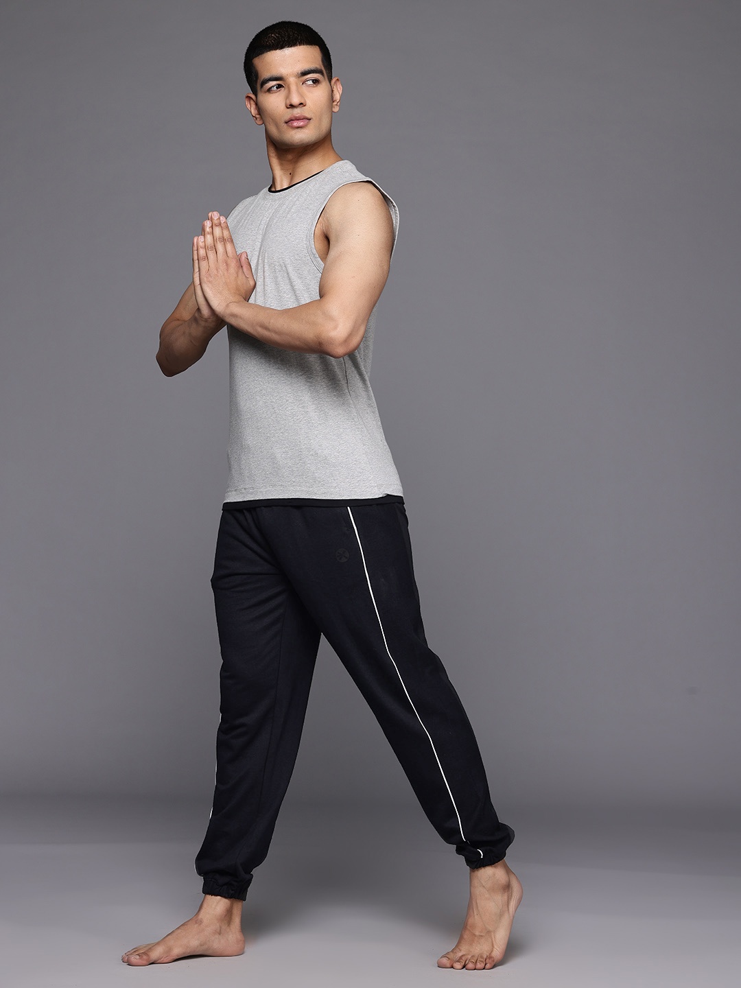 

HRX by Hrithik Roshan Men Contrast Piping Detailed Yoga Joggers, Black
