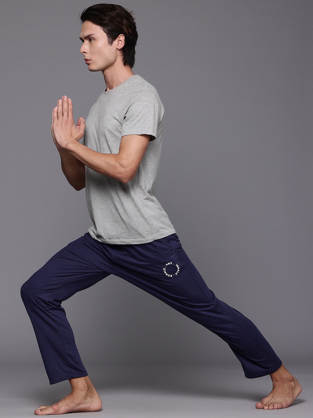 

HRX by Hrithik Roshan Men Blue Solid Yoga Trackpanrts