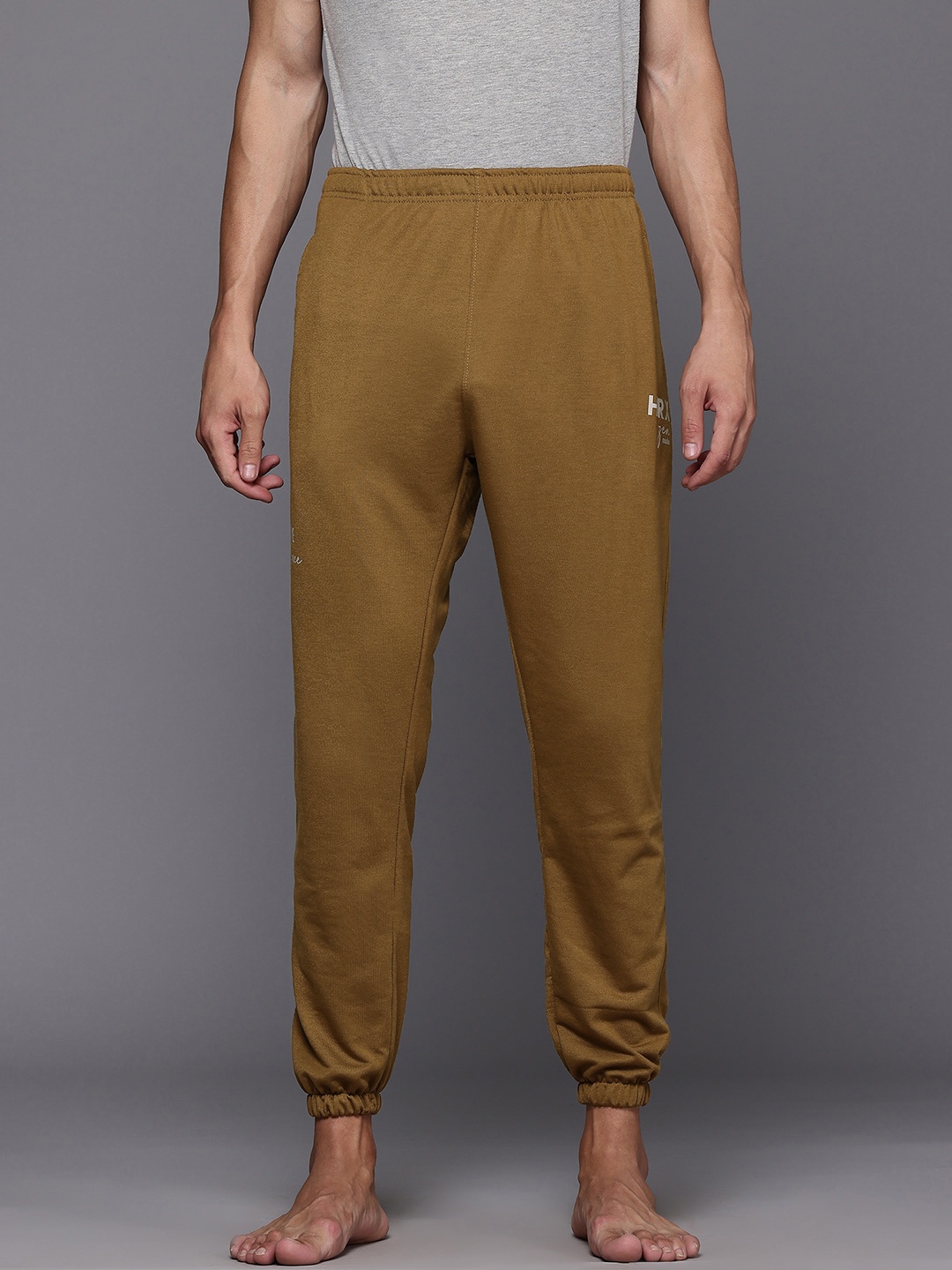

HRX by Hrithik Roshan Men Yoga Track Pants, Rust