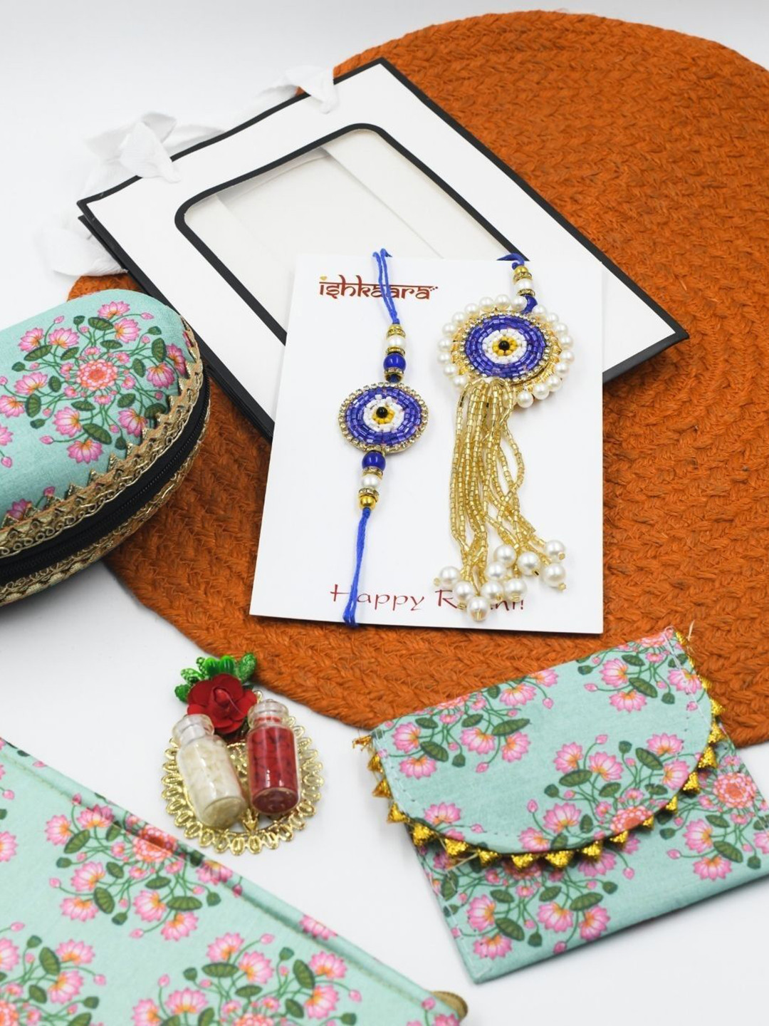 

ISHKAARA Set Of 5 Bhaiya Bhabhi Evil Eye Tassel Rakhi Gift Set, Blue