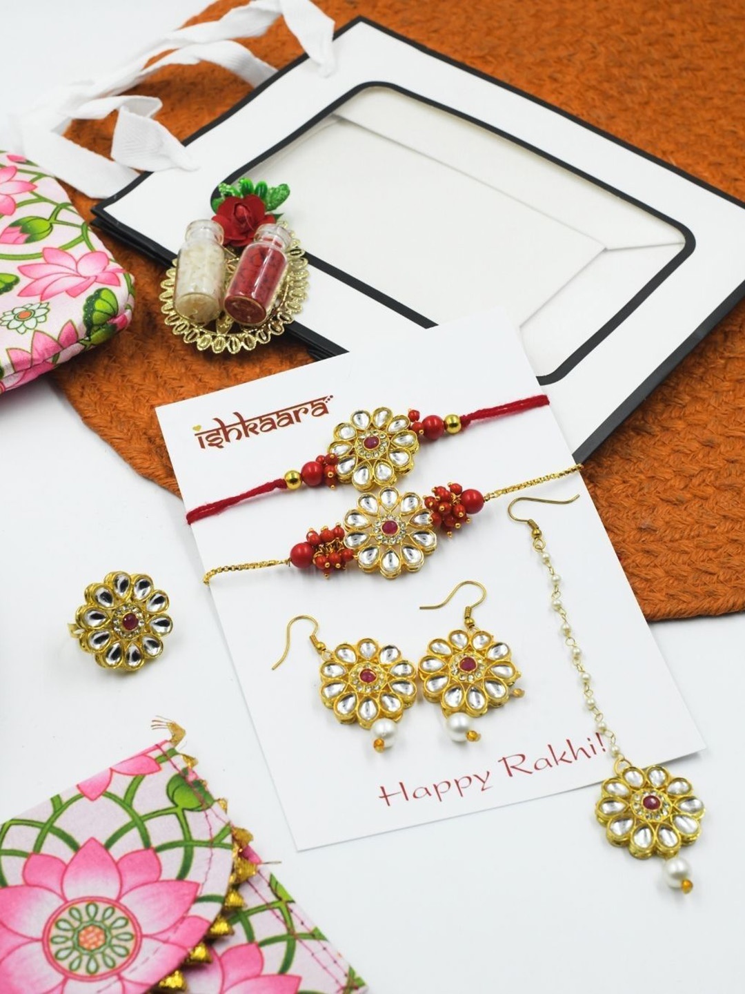 

ISHKAARA Set Of 5 Bhaiya Bhabhi Kundan Studded Tassel Rakhi Gift Set, Red