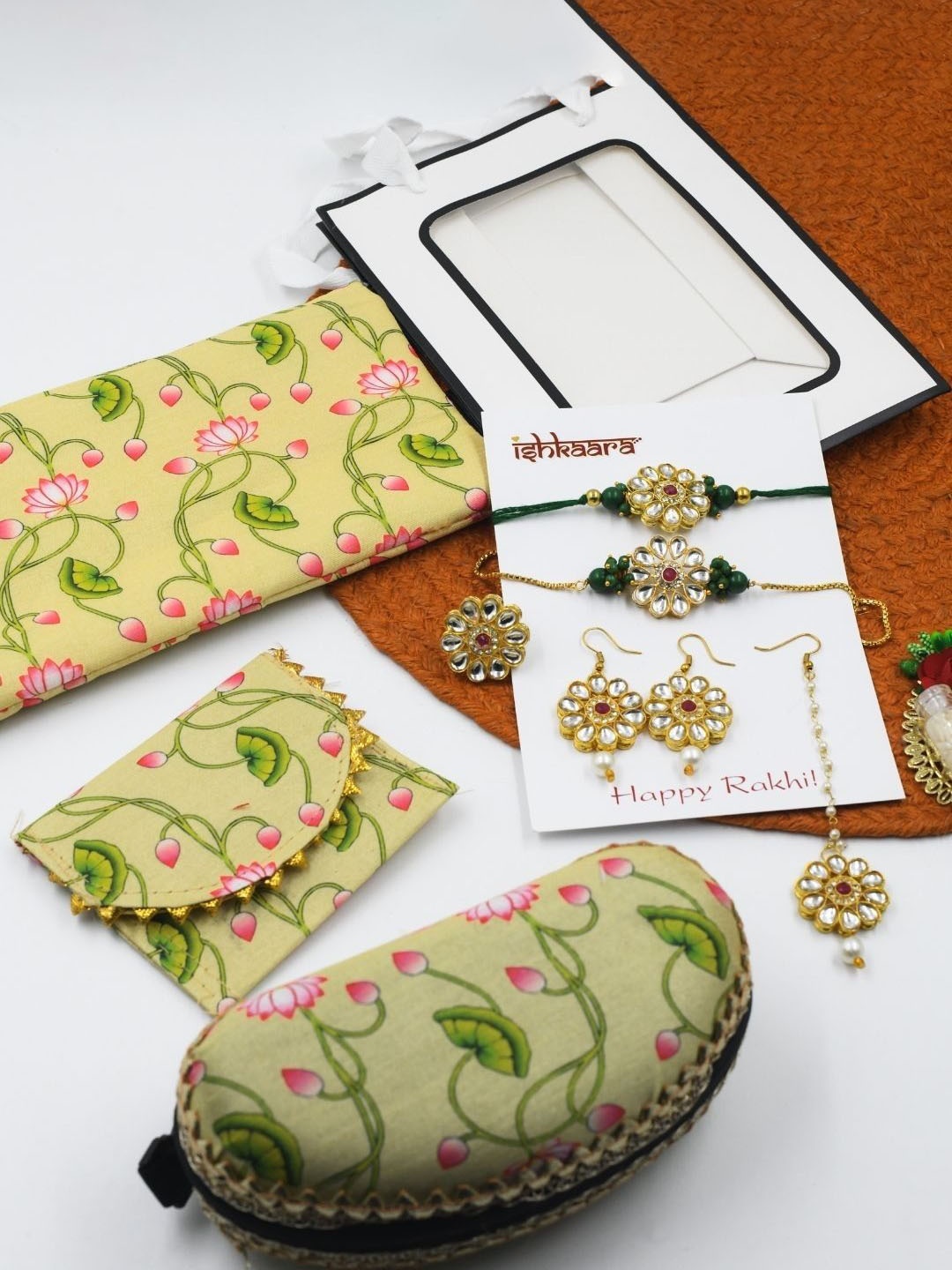 

ISHKAARA Set Of 8 Kundan Studded Jewelry Rakhi Gift Set With Roli Chawal, Green