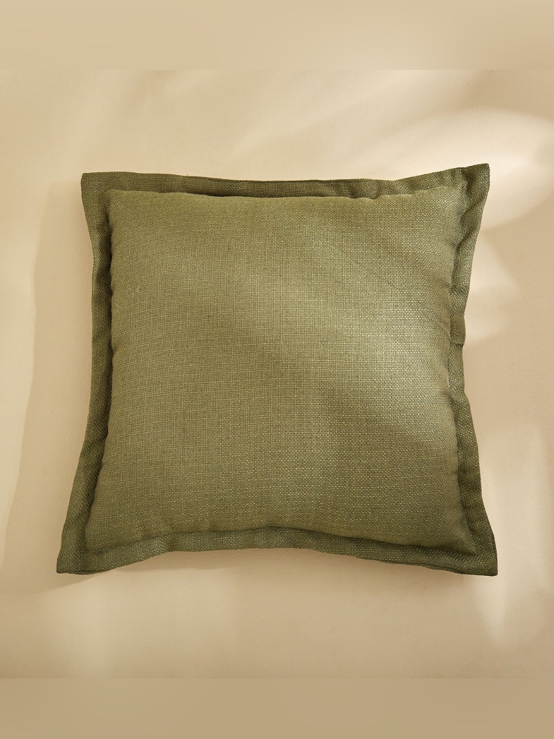 

Home Centre Green Textured Muse Filled Square Cushion