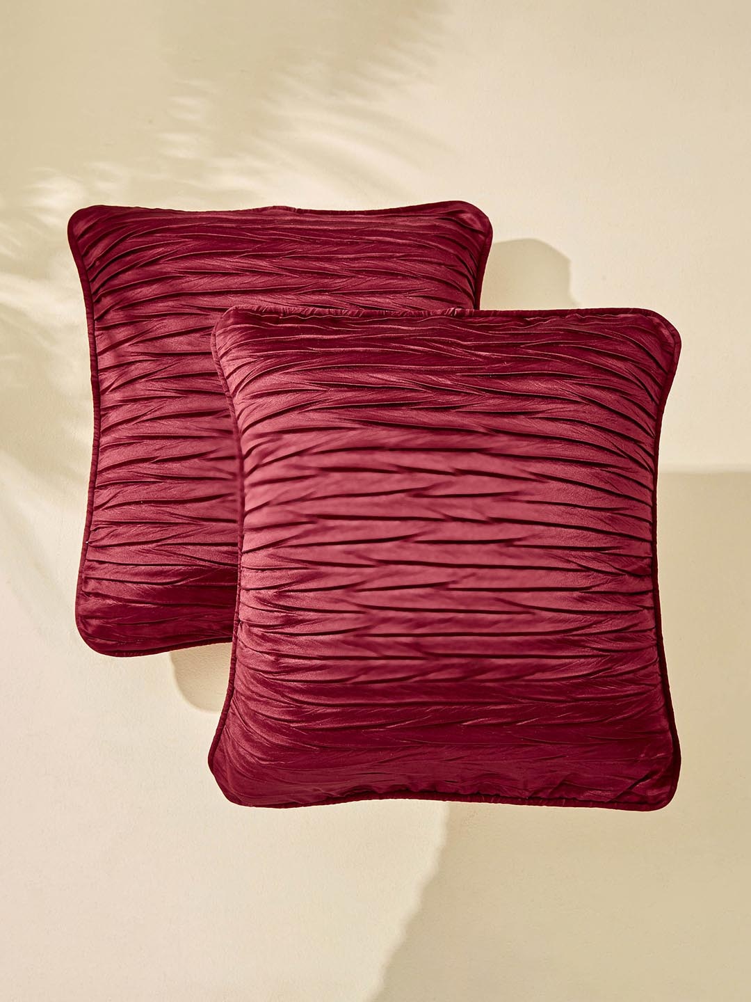 

Home Centre Corsica Maroon 2 Pieces Self Design Textured Square Cushion Covers