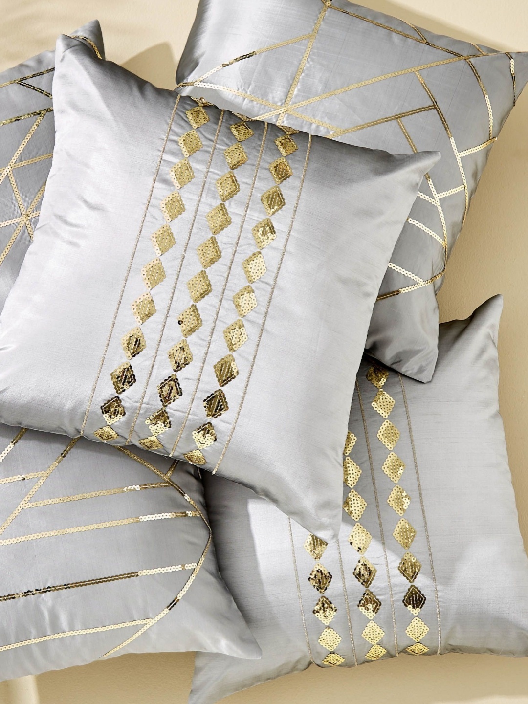

Home Centre Corsica Grey & Gold Toned 5 Pieces Geometric Embellished Square Cushion Covers