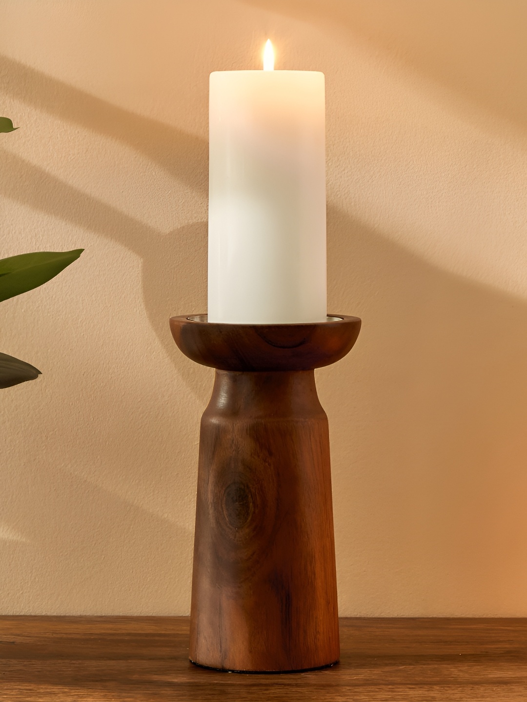 

Home Centre Brown Wooden Candle Holder