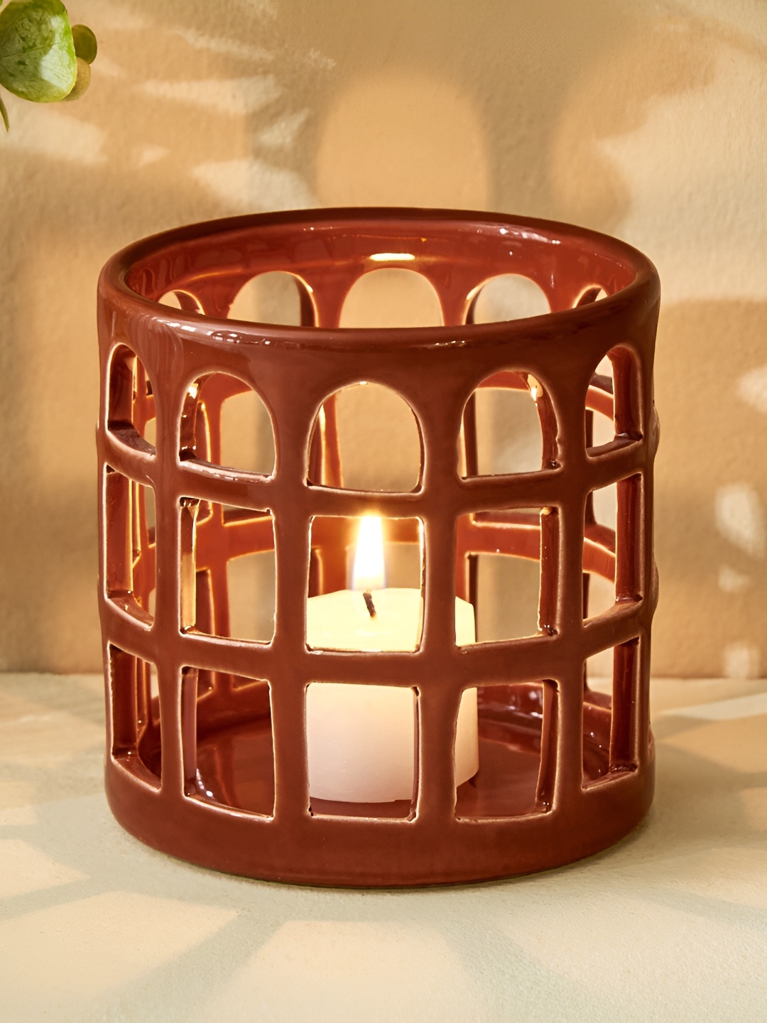 

Home Centre Splendid Brown Ceramic Townsquare Candle Holder