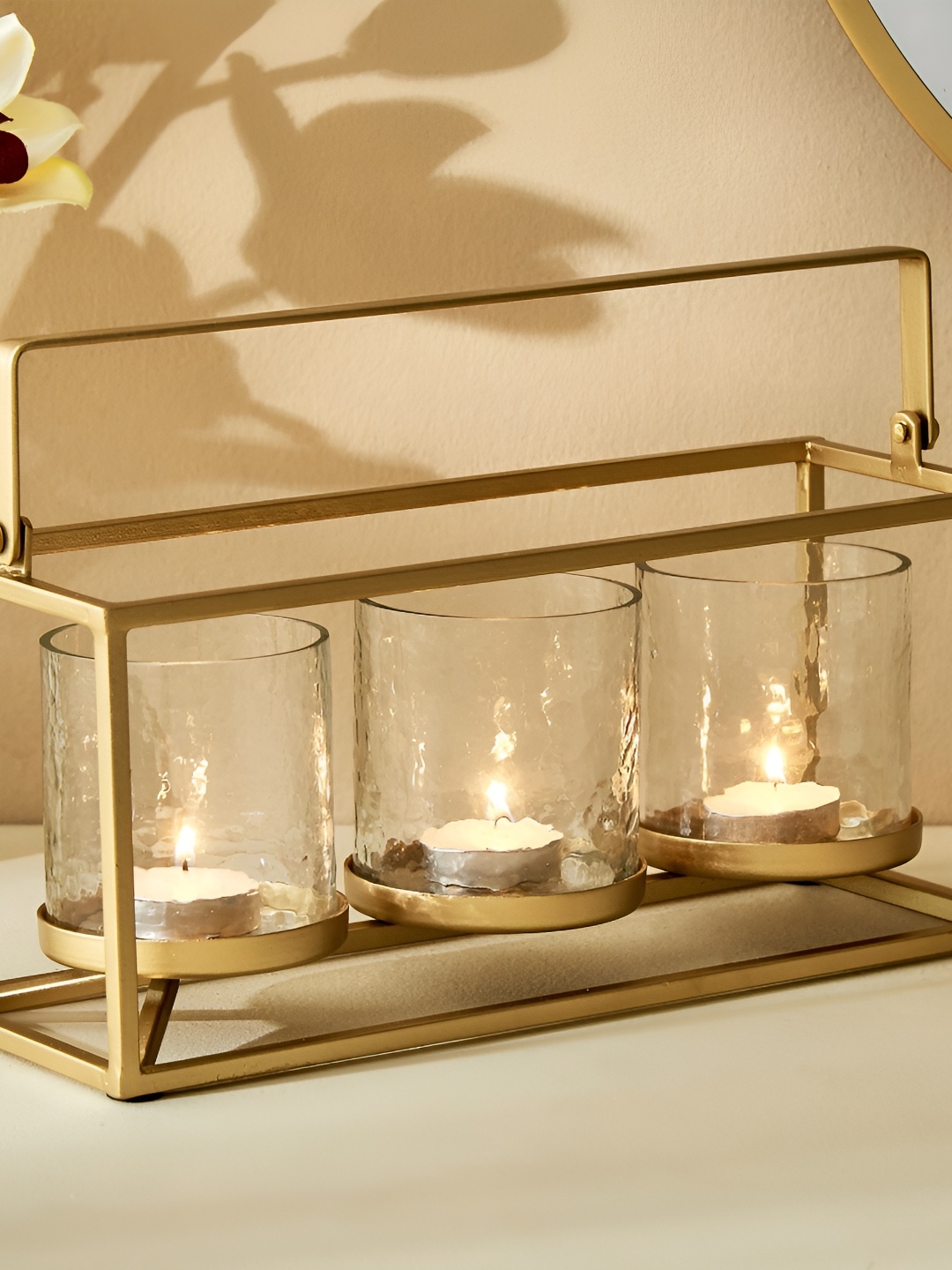 

Home Centre Gold-Toned T-Light Candle Holder