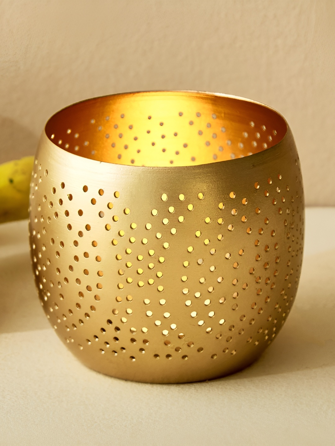 

Home Centre Gold-Toned Candle Holder