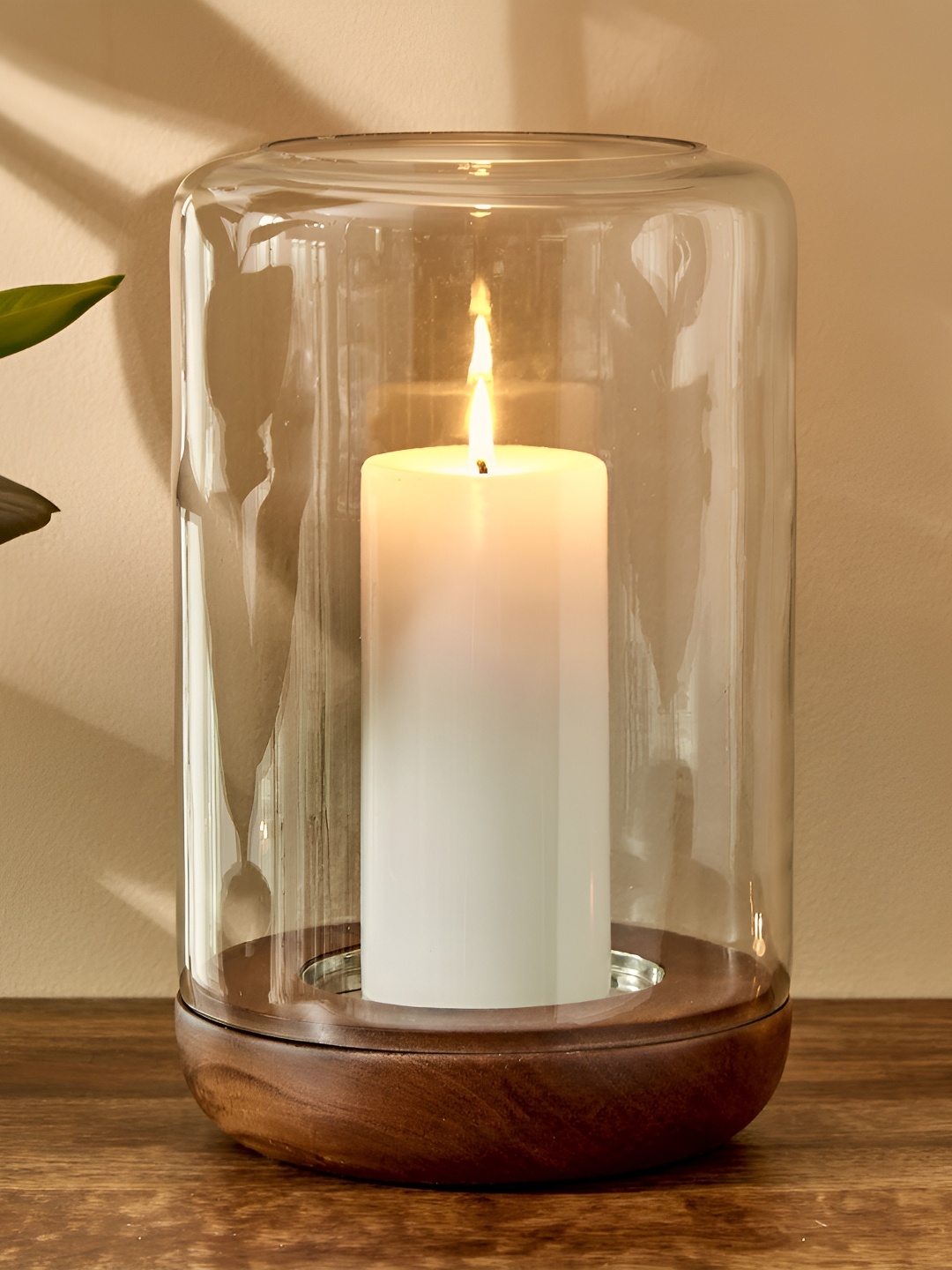 

Home Centre Transparent & Brown Hurricane Candle Holder