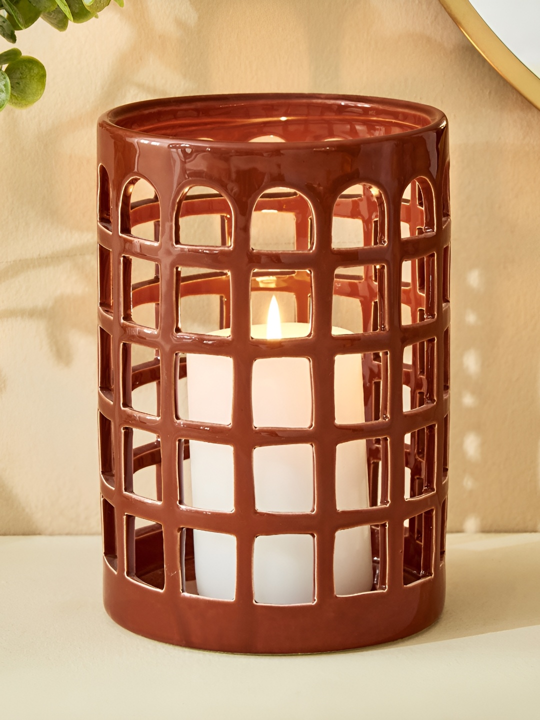 

Home Centre Splendid Brown Ceramic Townsquare Candle Holder