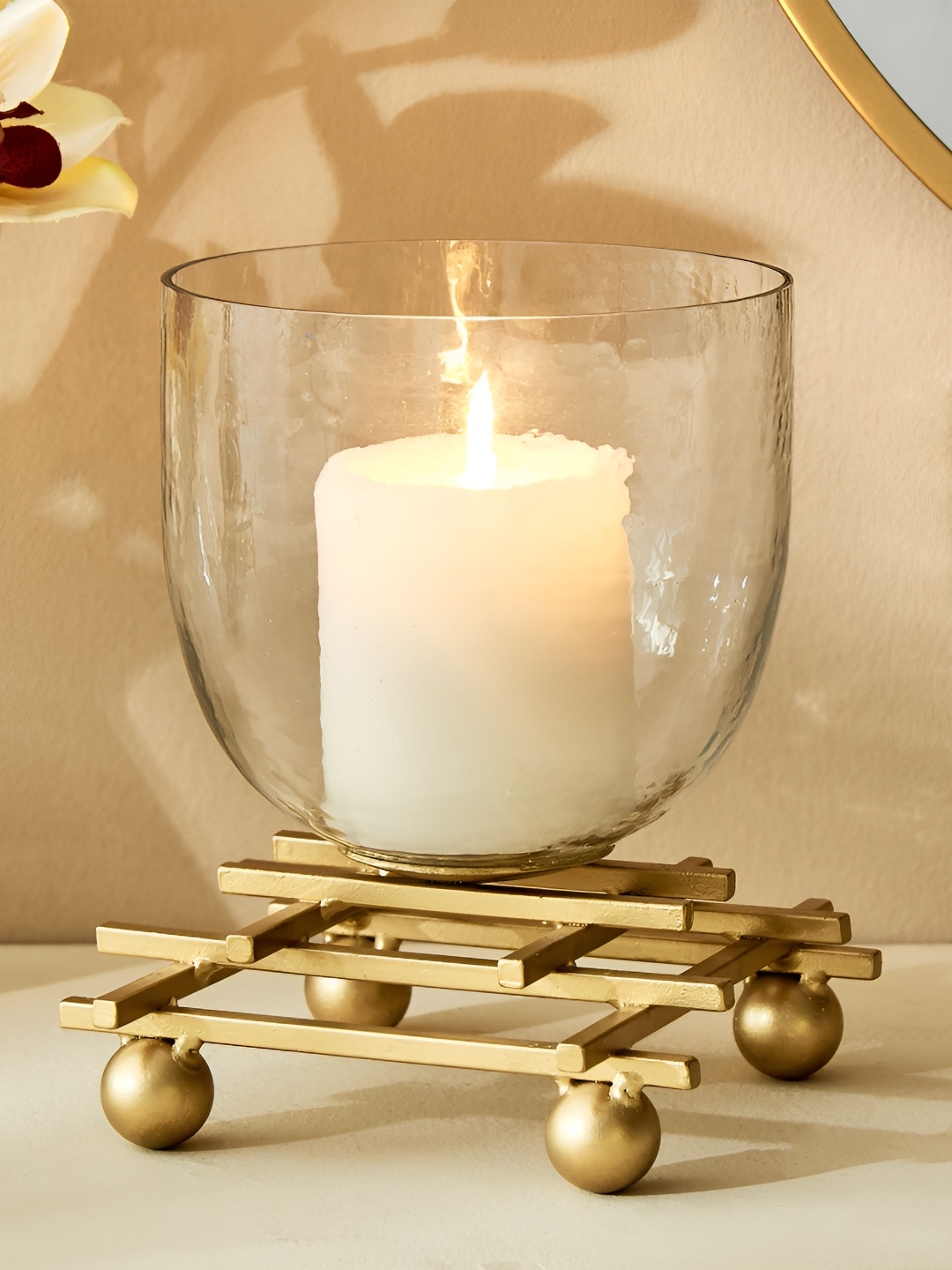 

Home Centre Splendid Gold-Toned Glass Hurricane Candle Holder