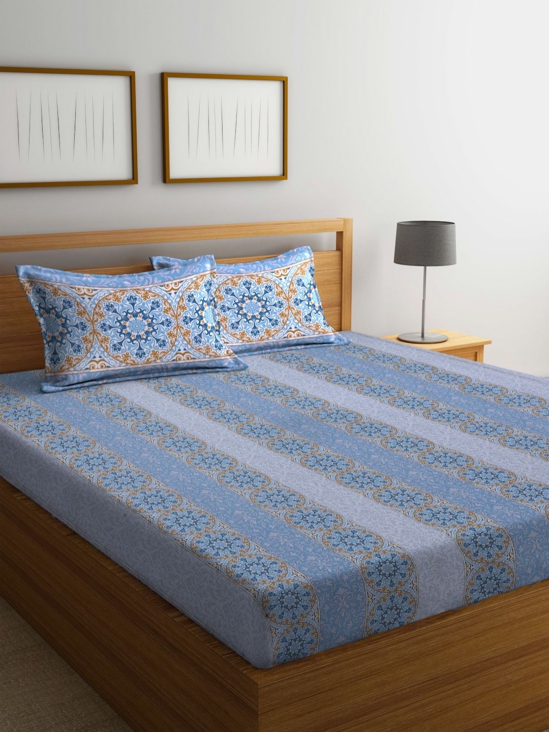 

BOMBAY DYEING Blue & Brown Printed 104 TC Pure Cotton Queen Bedsheet With 2 Pillow Covers