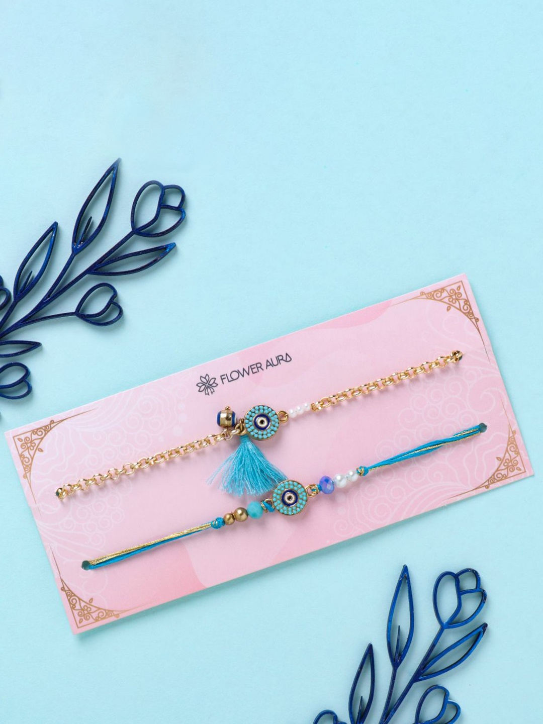 

Floweraura Evil Eye Beaded Bhaiya Bhabhi Rakhis With Roli Chawal, Gold