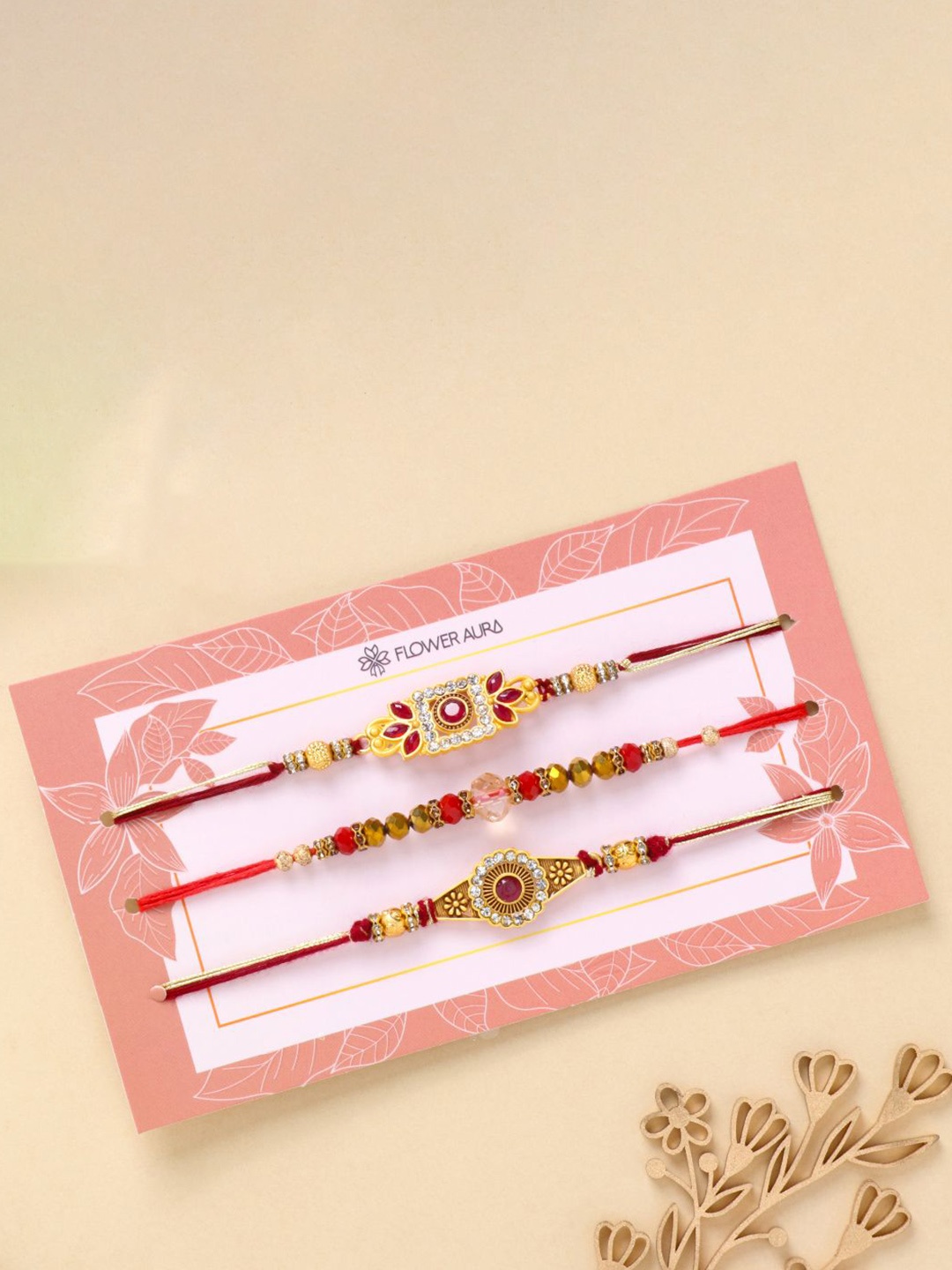 

Floweraura Set Of 3 Stone Studded & Beaded Thread Rakhi With Roli Chawal, Gold