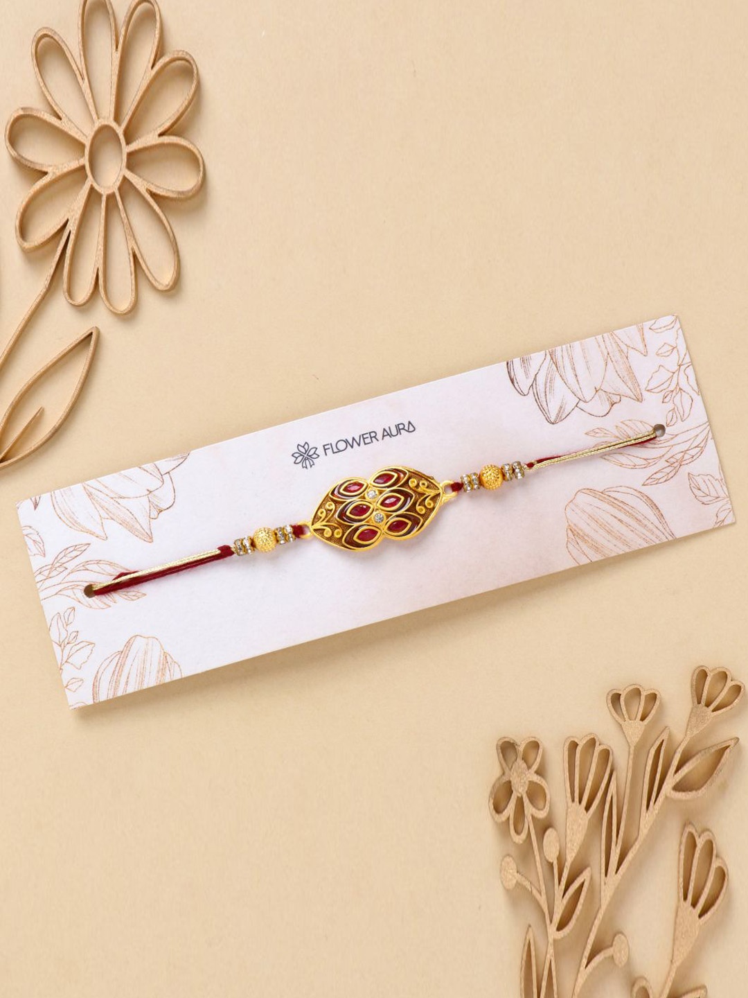 

Floweraura Embellished Thread Rakhi With Roli & Chawal, Yellow