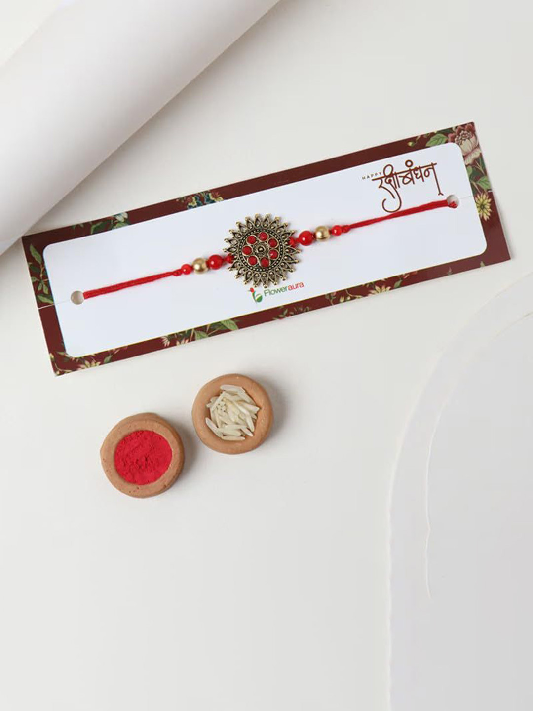 

Floweraura Beaded Thread Rakhi with Roli Chawal, Gold