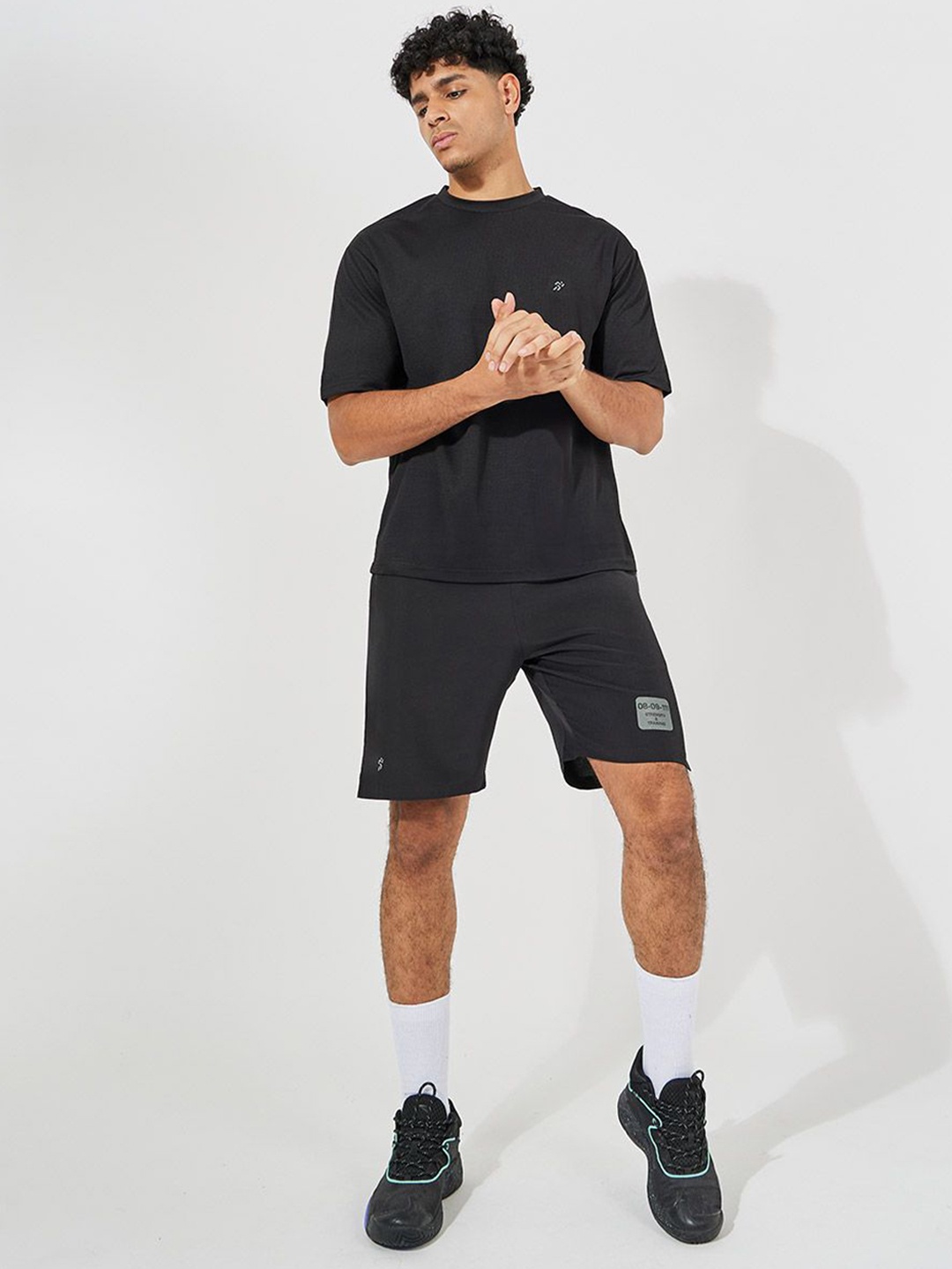 

Styli Soft Texture Knit Oversize Training Tee with Printed Workout Shorts, Black