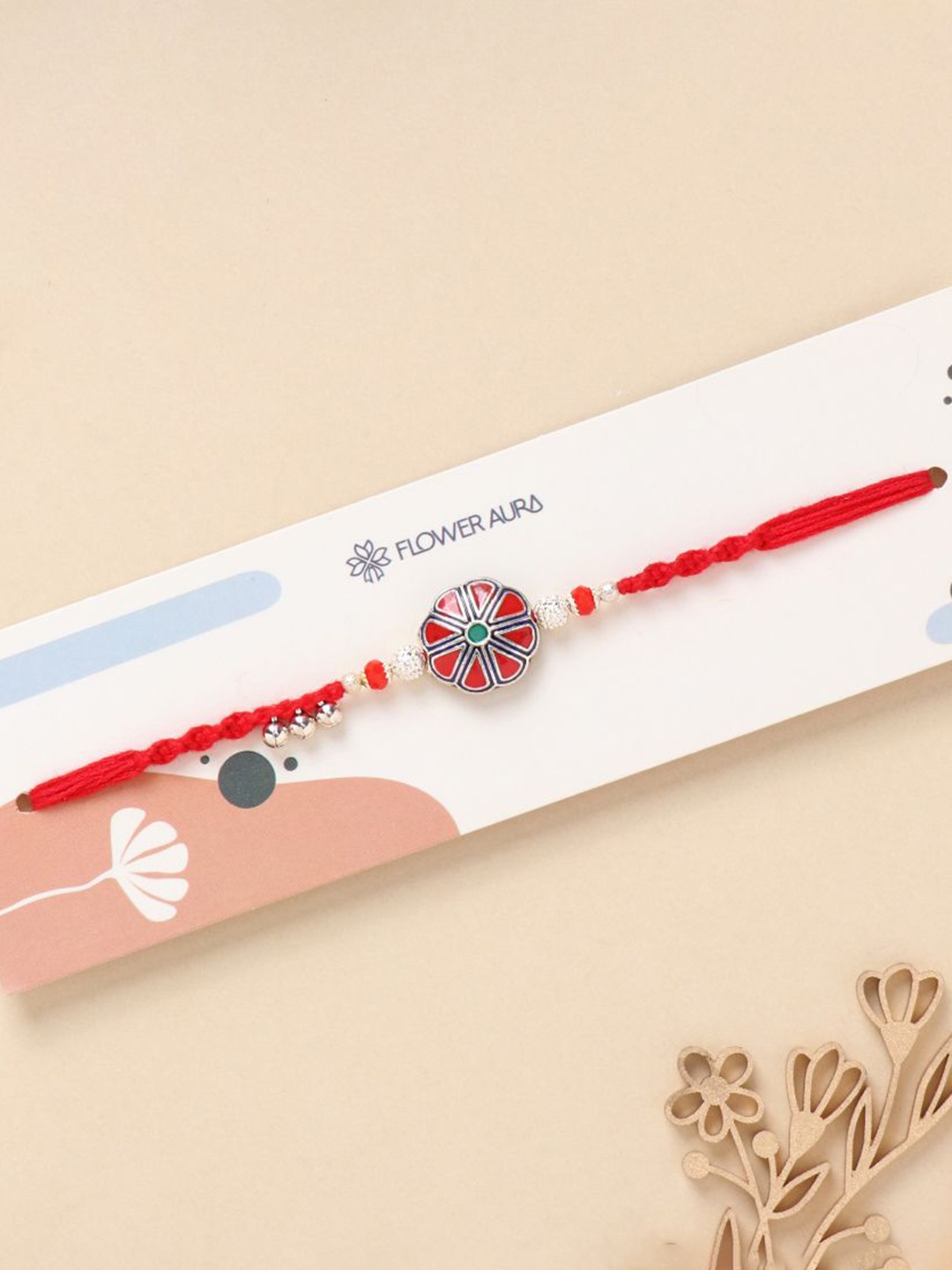 

Floweraura Floral Charm Beaded Thread Rakhi With Roli Chawal, Red
