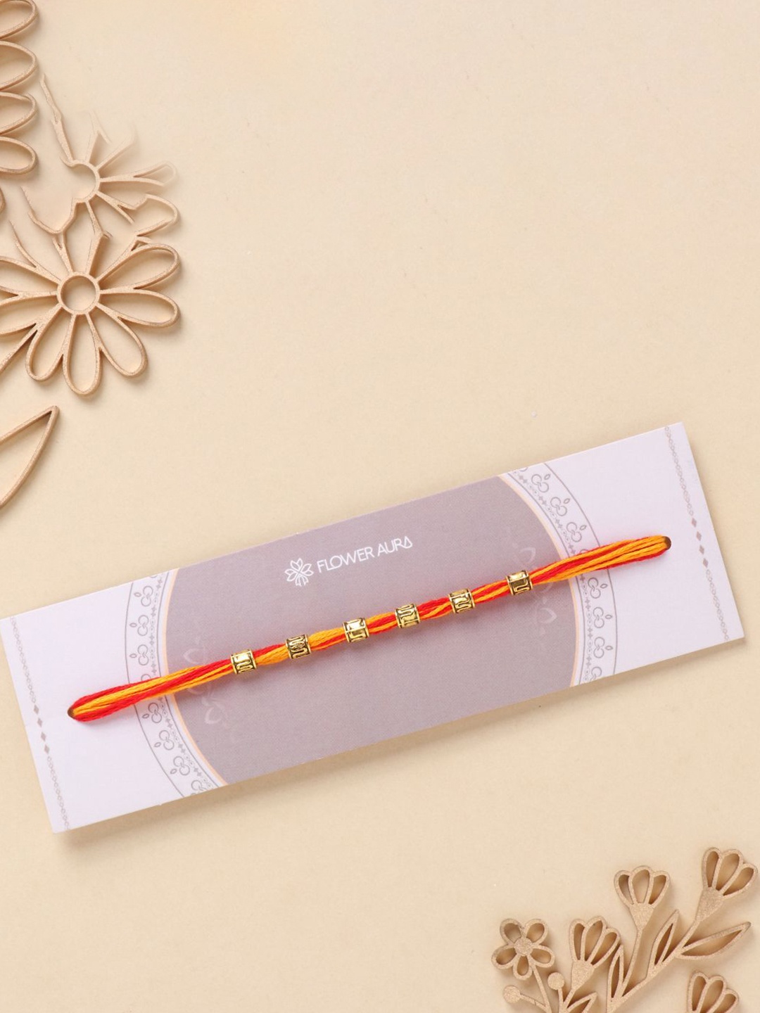 

Floweraura Embellished Mauli Thread Rakhi With Roli Chawal, Red