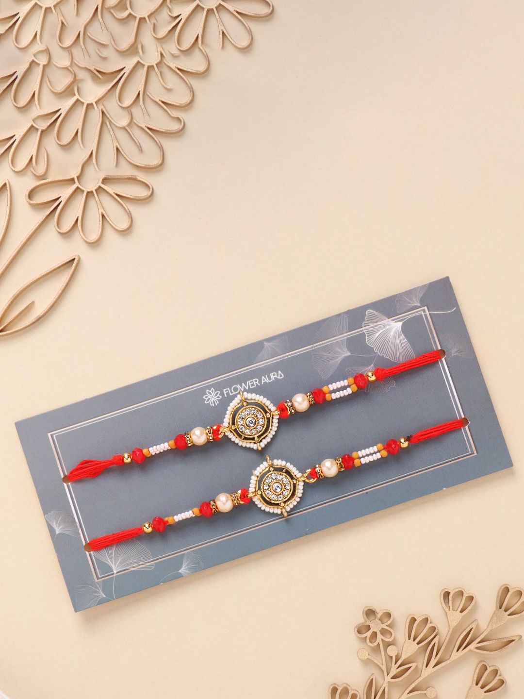 

Floweraura Set of 2 Beaded Thread Rakhis with Roli Chawal, Red