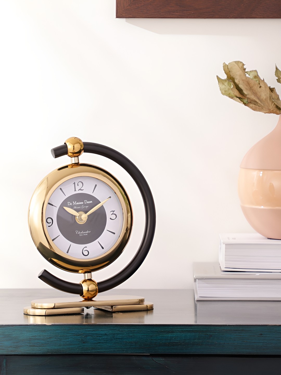 

Decor de Maison Gold Toned & White Printed Round Contemporary Metal Table Clock