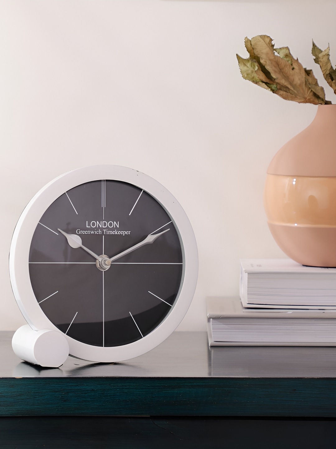 

Decor de Maison White & Black Printed Round Contemporary Metal Table Clock