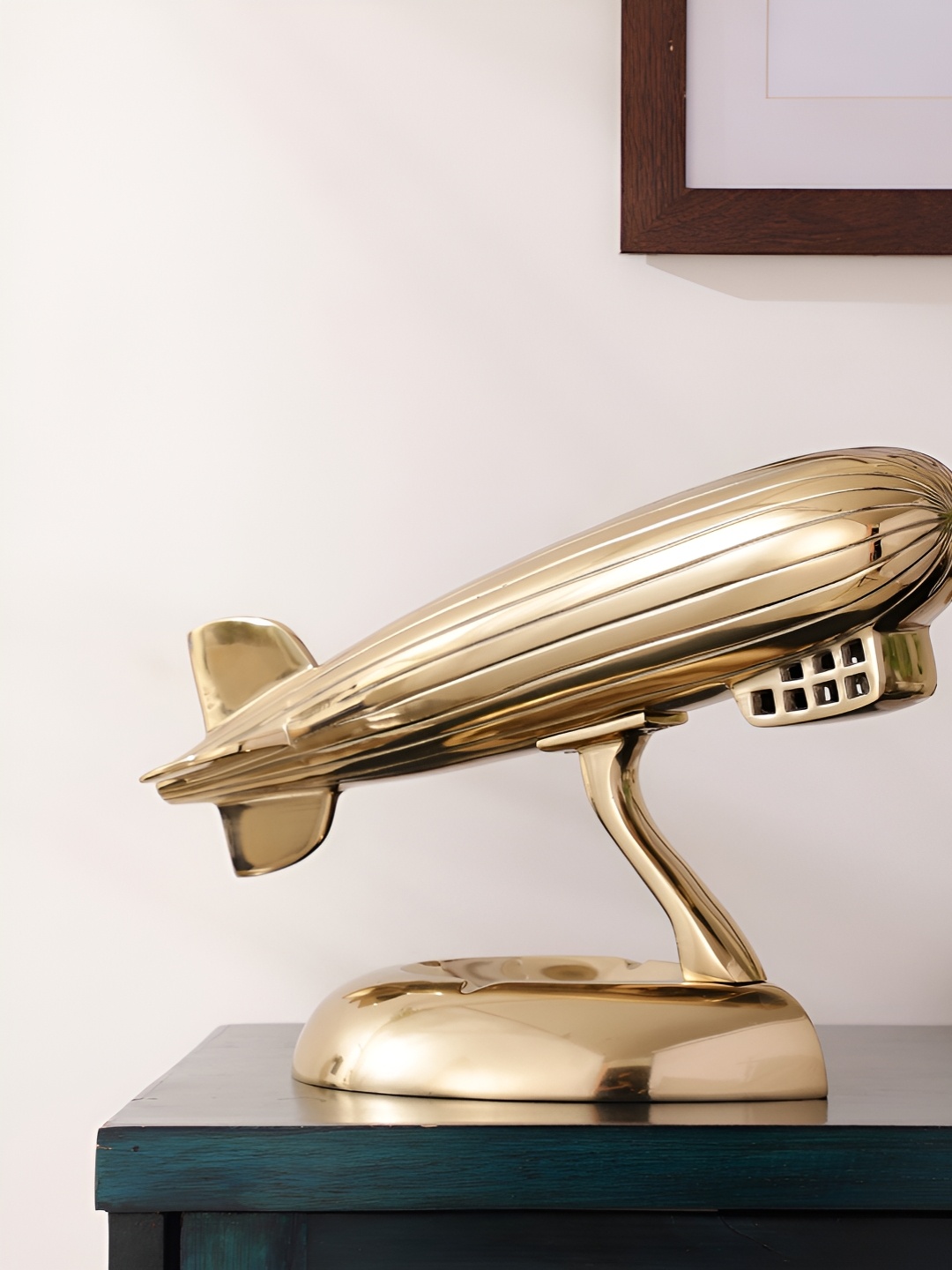 

Decor de Maison Gold-Toned Curio Showpiece