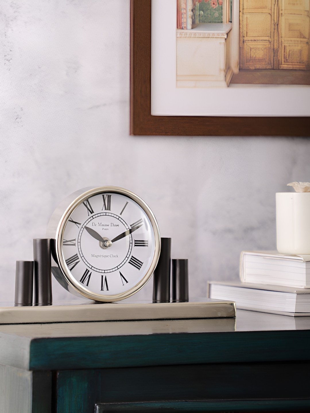 

Decor de Maison Silver Toned & White Printed Round Contemporary Metal Table Clock