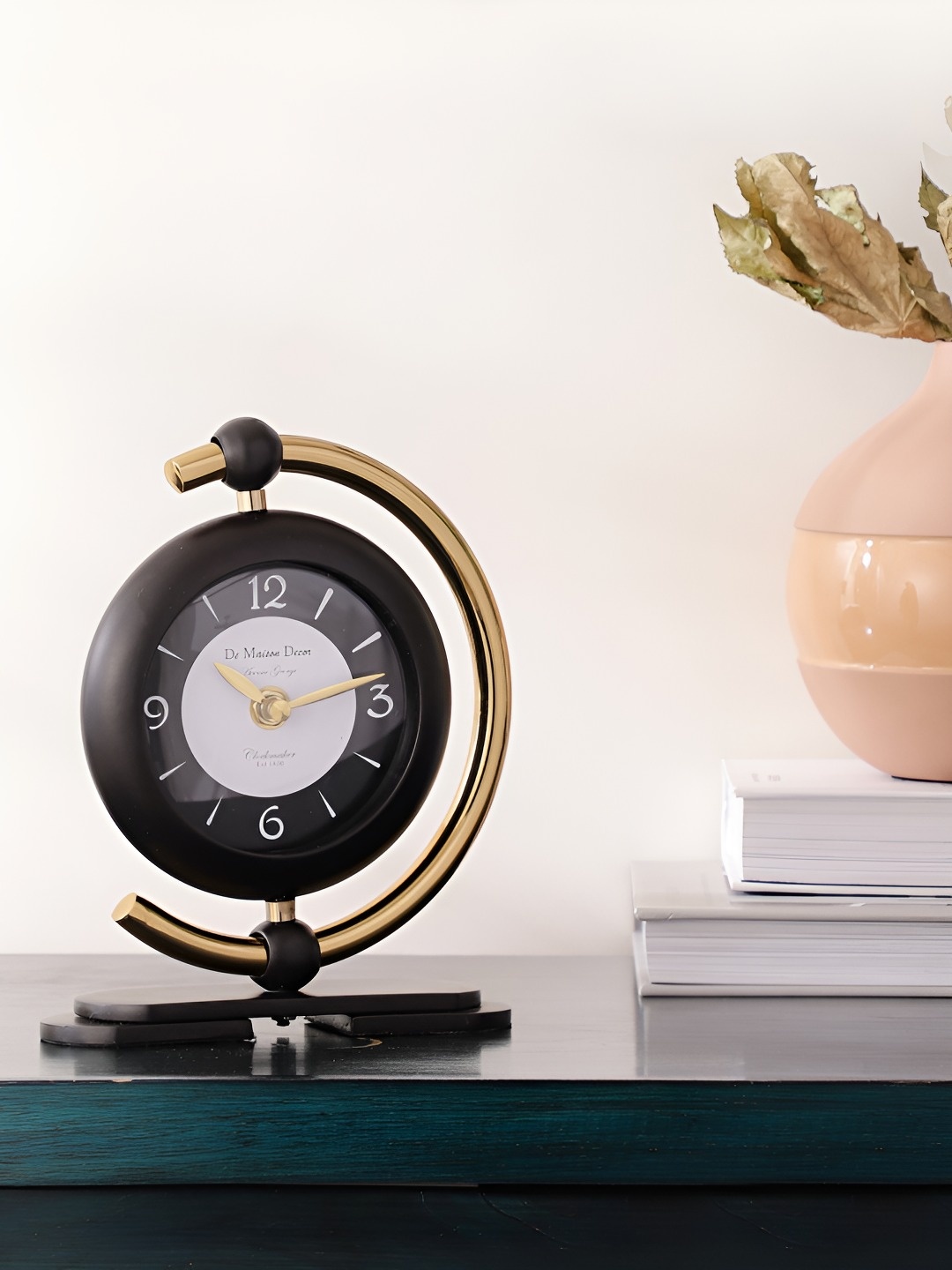 

Decor de Maison Black & White Printed Round Contemporary Metal Table Clock