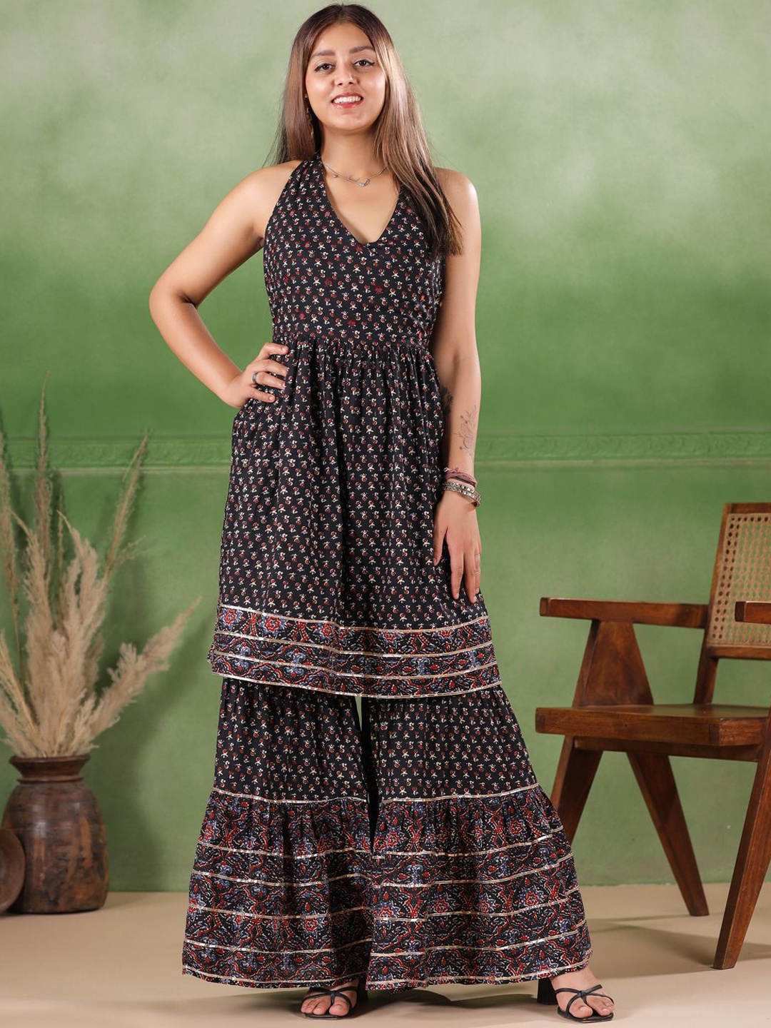 

Sangria Black Floral Printed Sleeveless Pure Cotton A-Line Kurta With Sharara