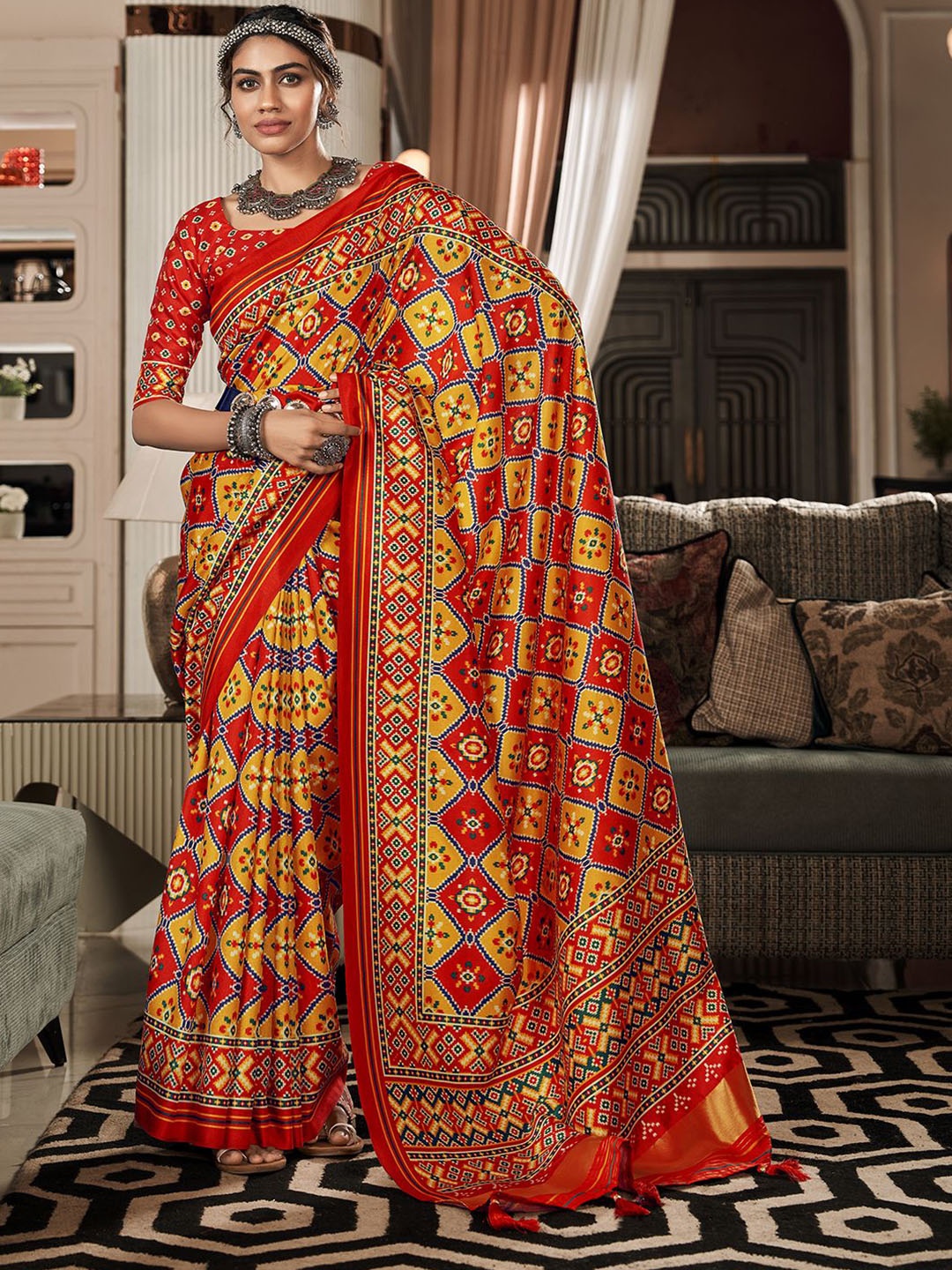 

Mitera Ethnic Motifs Patola Saree, Yellow