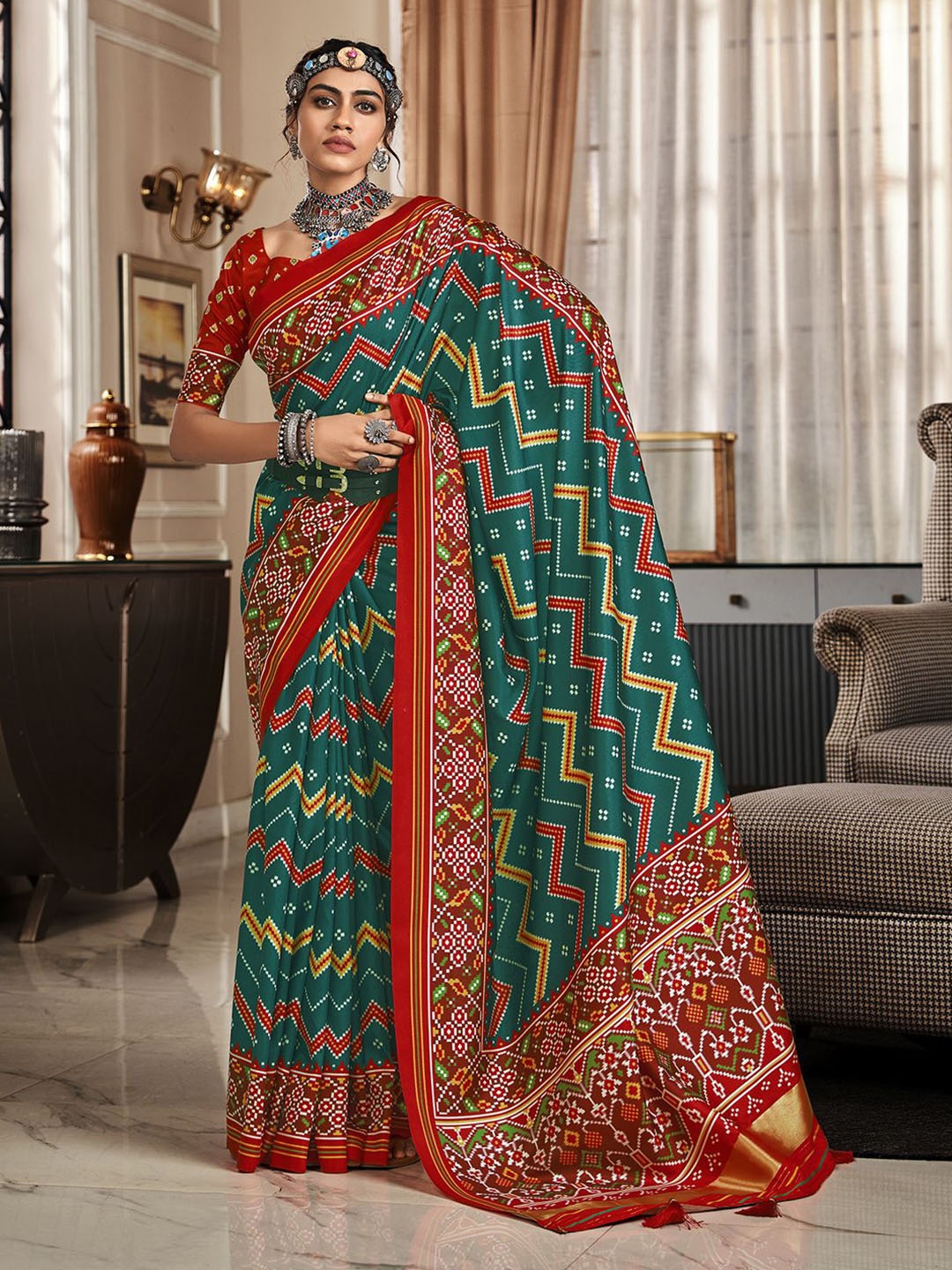 

Mitera Geometric Printed Patola Saree, Teal