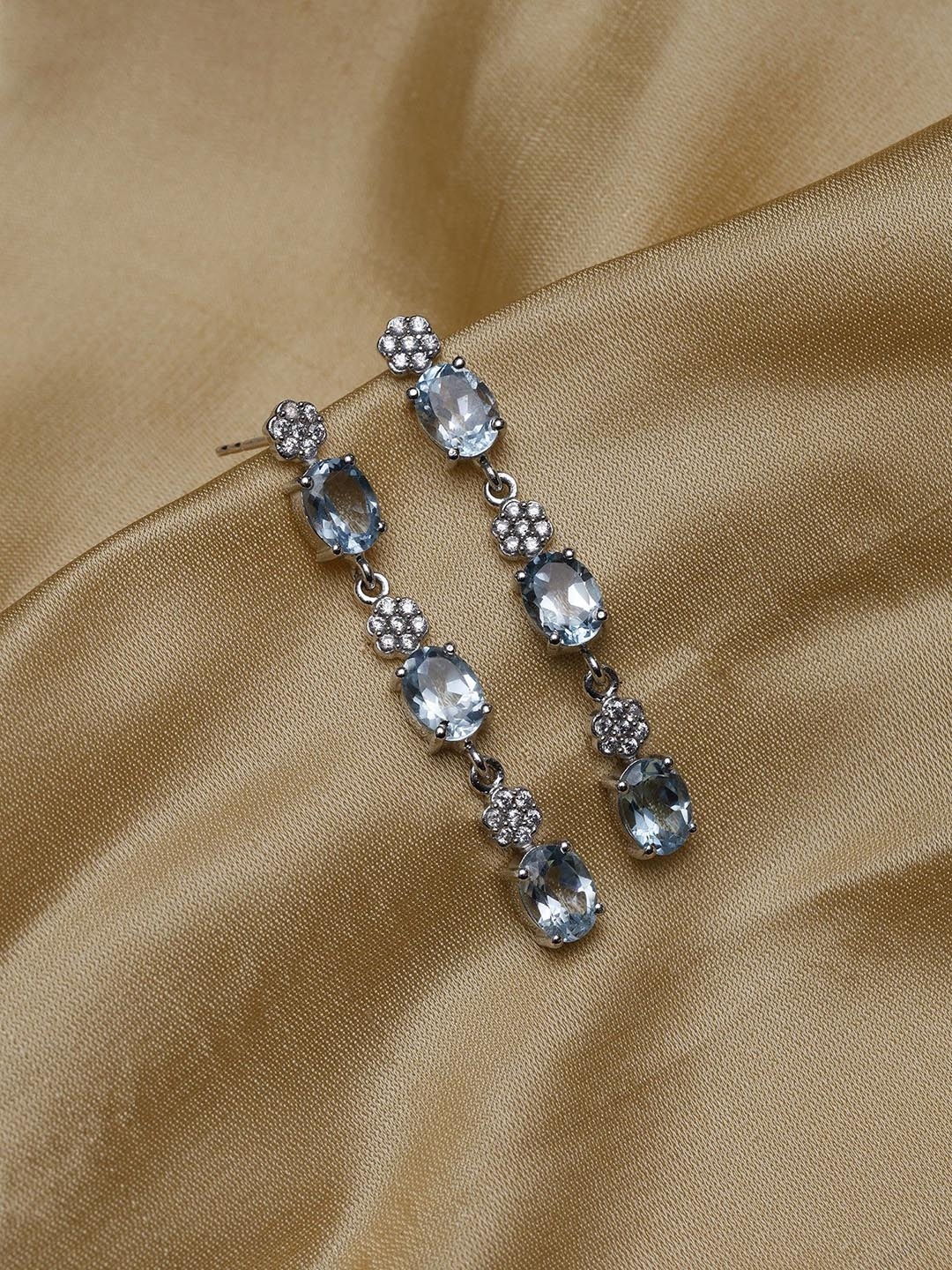 

Exotic India Faceted Blue Topaz Gemstones Sterling Silver Dangler Earrings