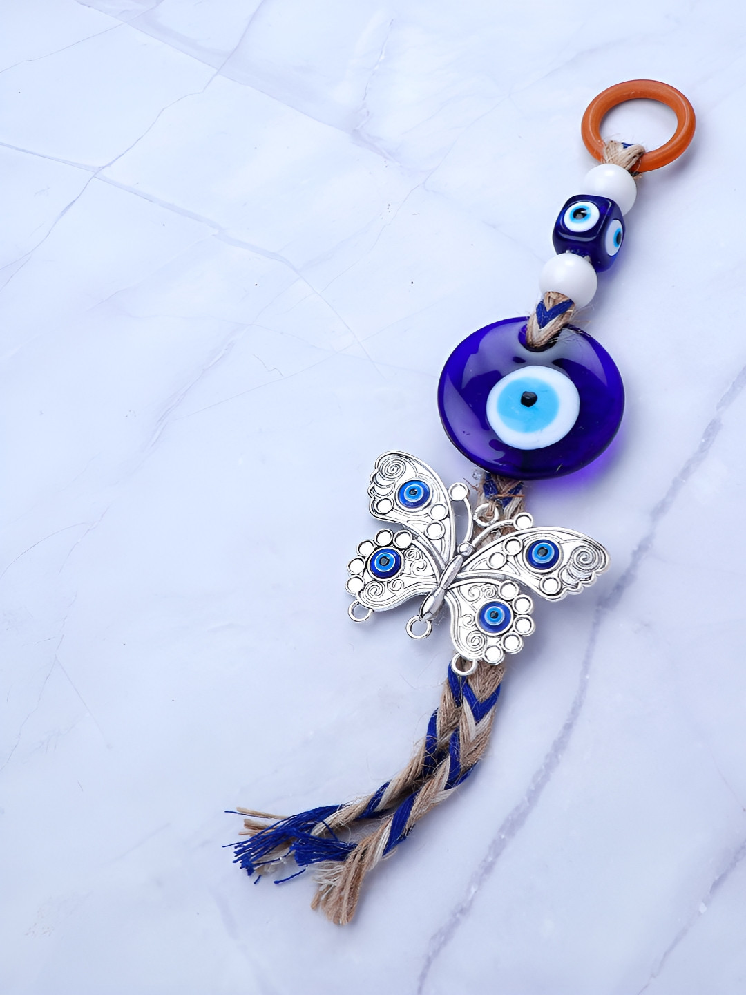 

Archies Blue & White Textured Butterfly Evil Eye Wall Hanging