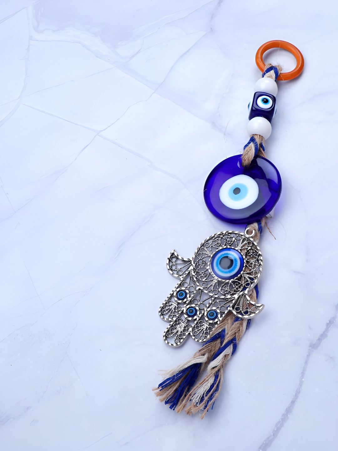 

Archies Blue & White Textured Hand Evil Eye Wall Hanging