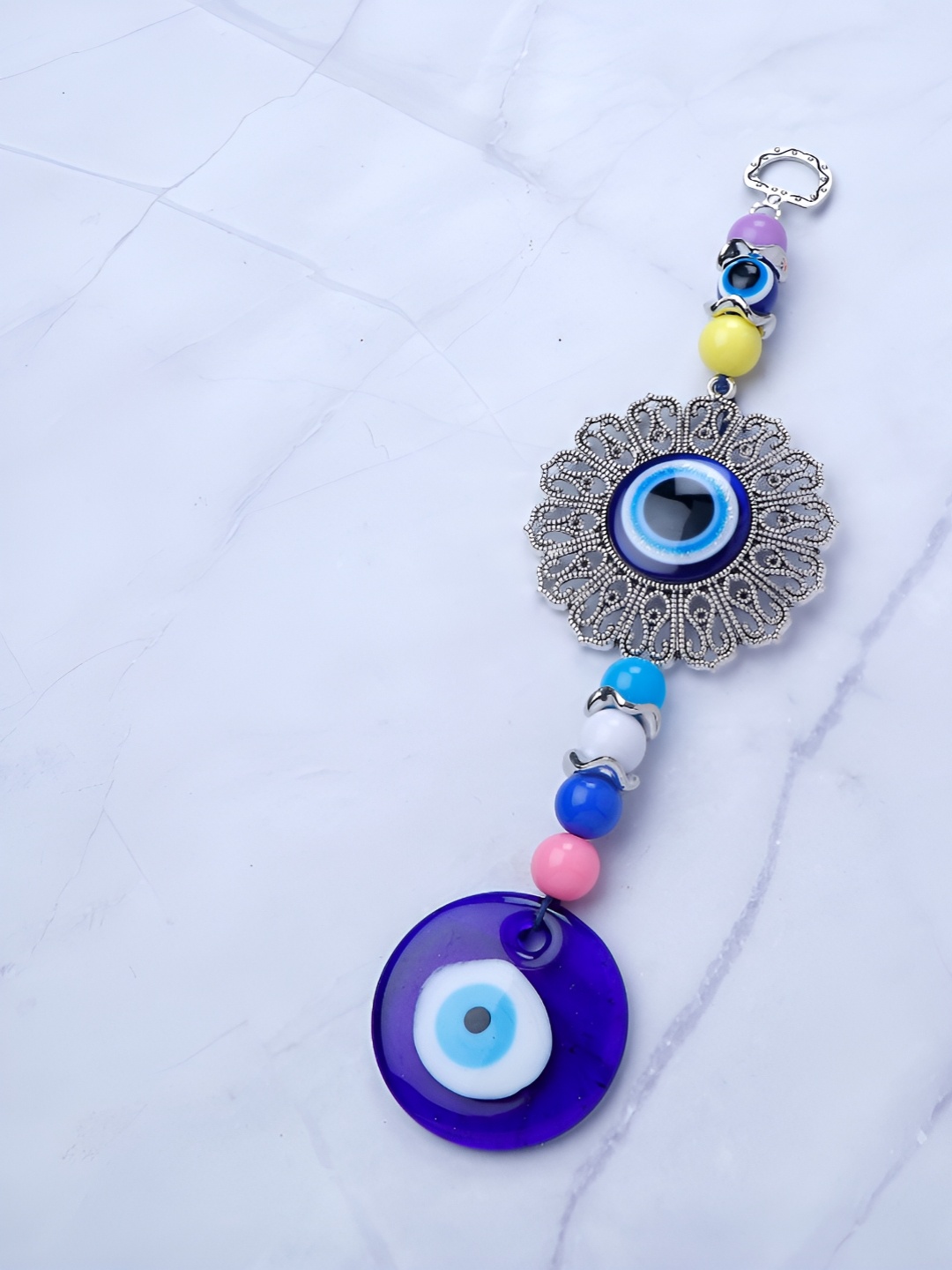 

Archies Blue & Black Textured Evil Eye Wall Hanging